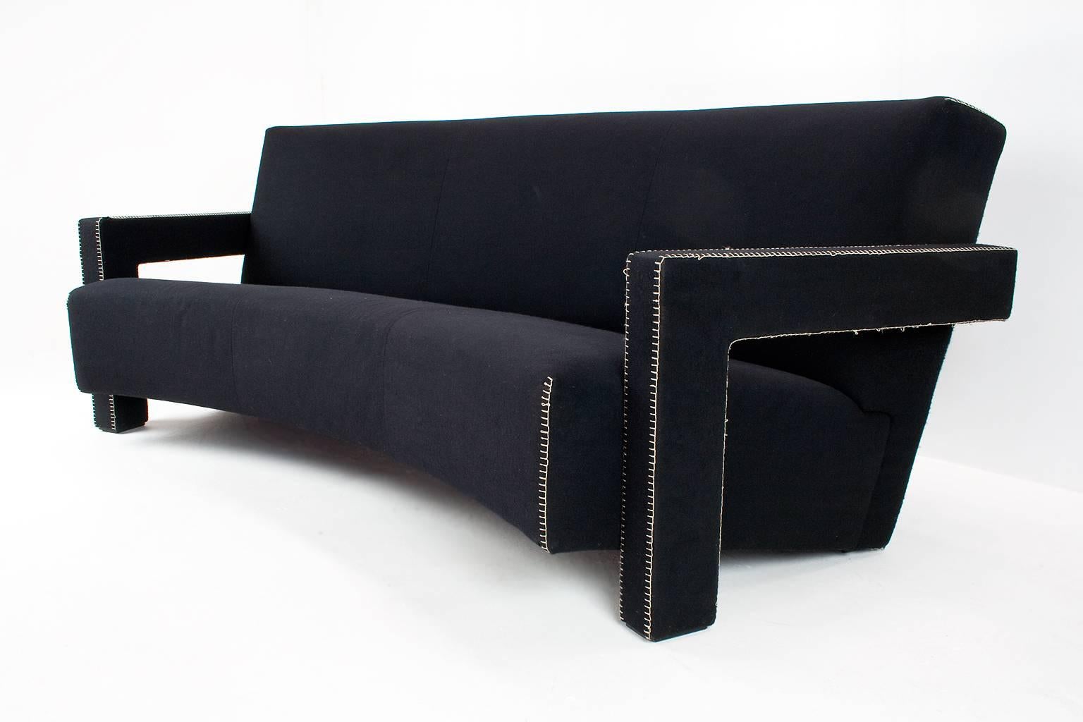 Original festinated 'Utrecht' sofa, in soft black fabric and wood, by Gerrit Thomas Rietveld, the Netherlands, designed 1935. This sofa is numbered 0223 from the Cassina collection 1988-2011.

This sofa has it's original black upholstery with