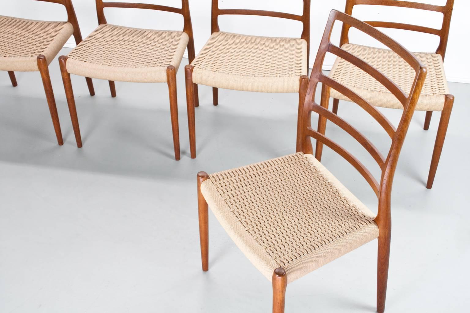 Danish Set of 5 Scandinavian Modern Chairs in teak and paper cord by Niels Moller