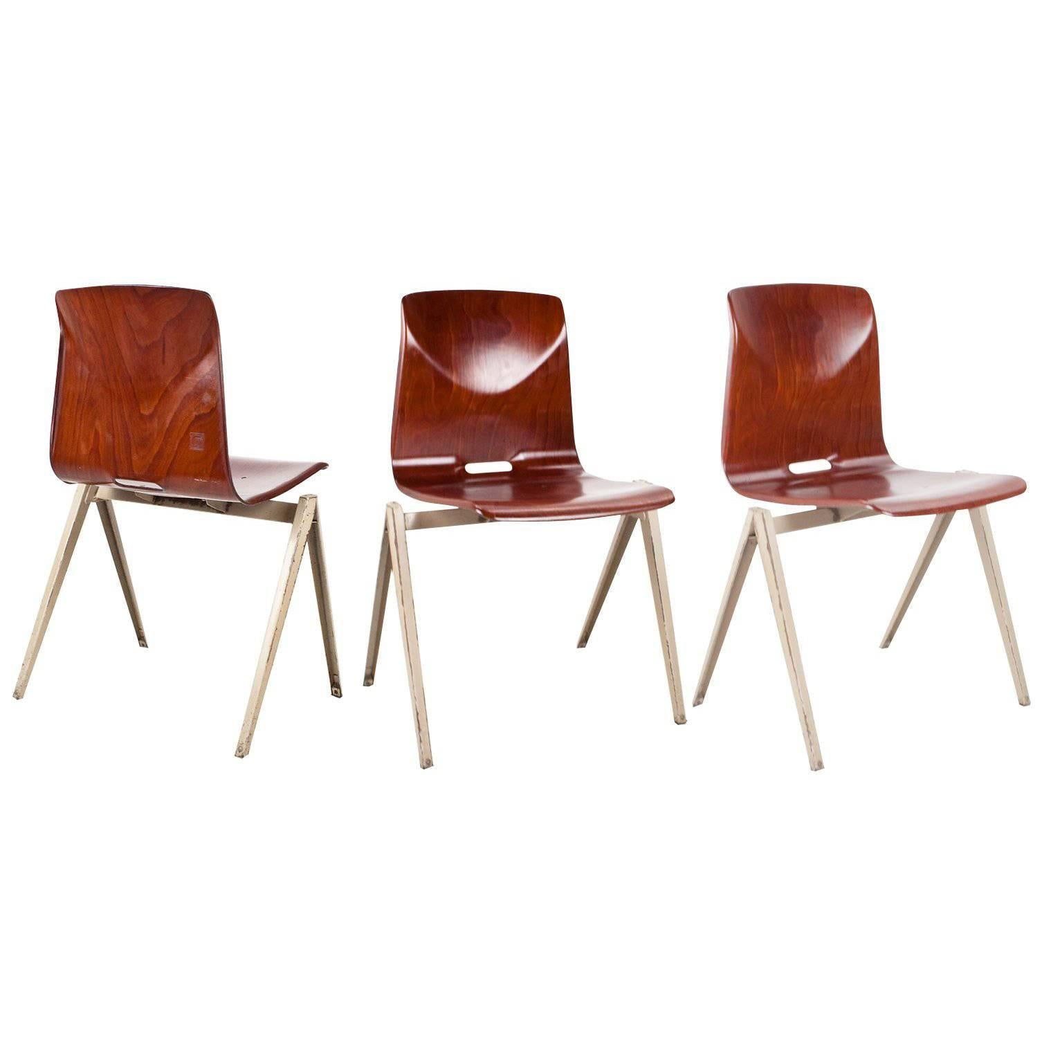 Original industrial Dutch Galvanitas school chairs, model S 22, set of eight. Chairs with pyramid frame, designed in 1967 by Galvanitas and inspired by the pyramid chairs of Wim Rietveld. 

The chairs are coproduced by Galvanitas and Pagholz