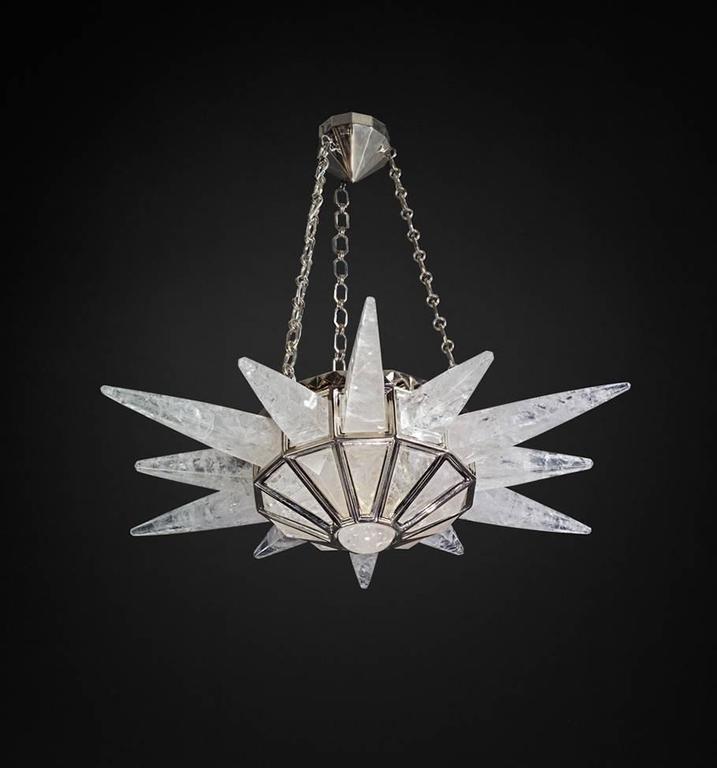 Rock crystal quartz Sunshine II light, silver edition.
Original model design by Alexandre Vossion.
The fixture, chains and canopy of this rock crystal chandelier are handmade in bronze in Paris.
Workers who made this model worked also for the best
