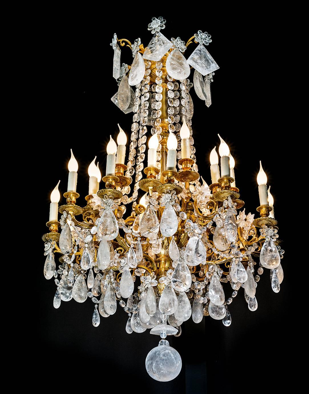 French ormolu bronze chandelier in the style of Louis XVI.
Modern rock crystal quartz stone specially carved for this chandelier.
24 lights.
Unique.