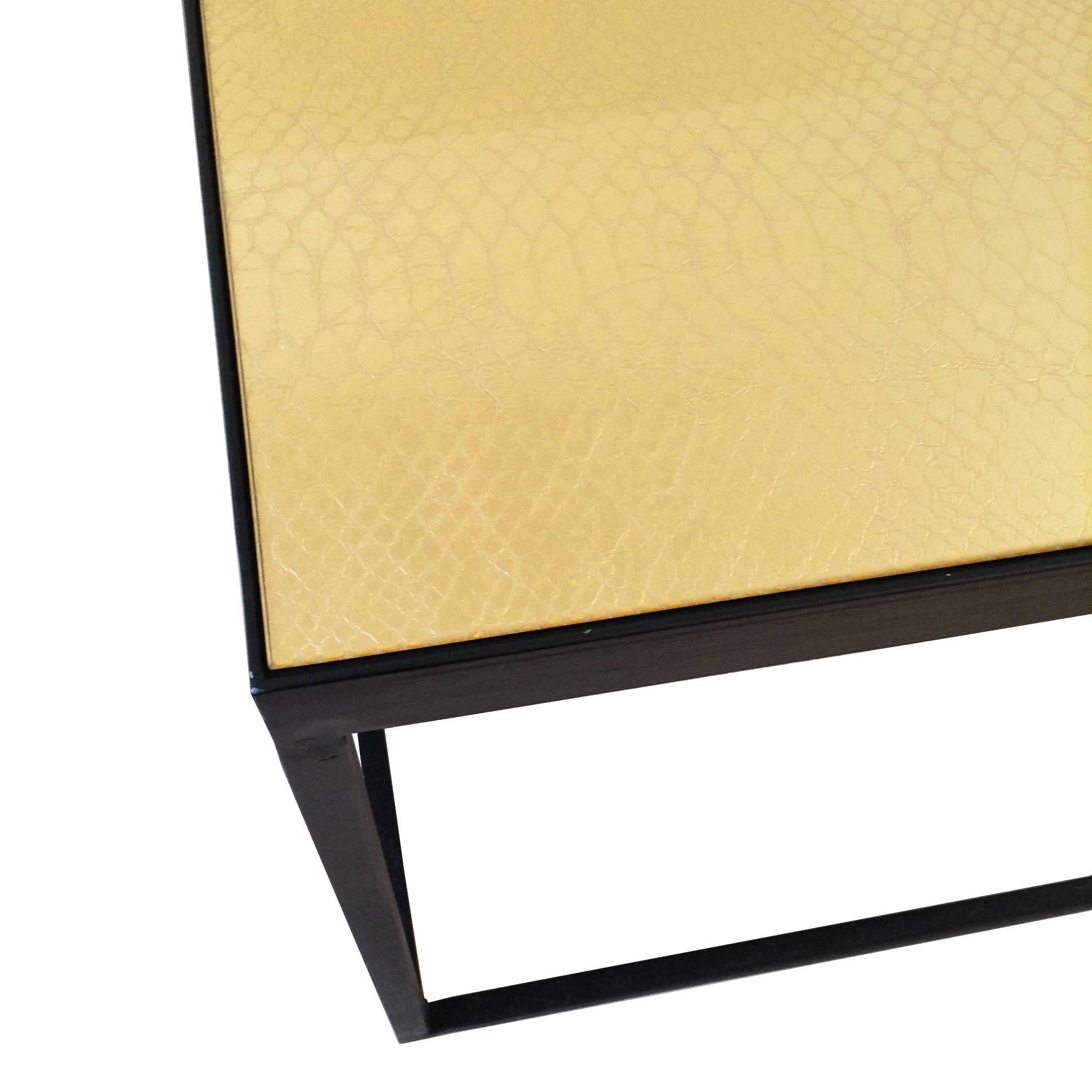 Matt black frame side tables with gold snakeskin print leather and glass top.

Currently on sale as ex-display:

1 x W50 x D50 x H45 cm
