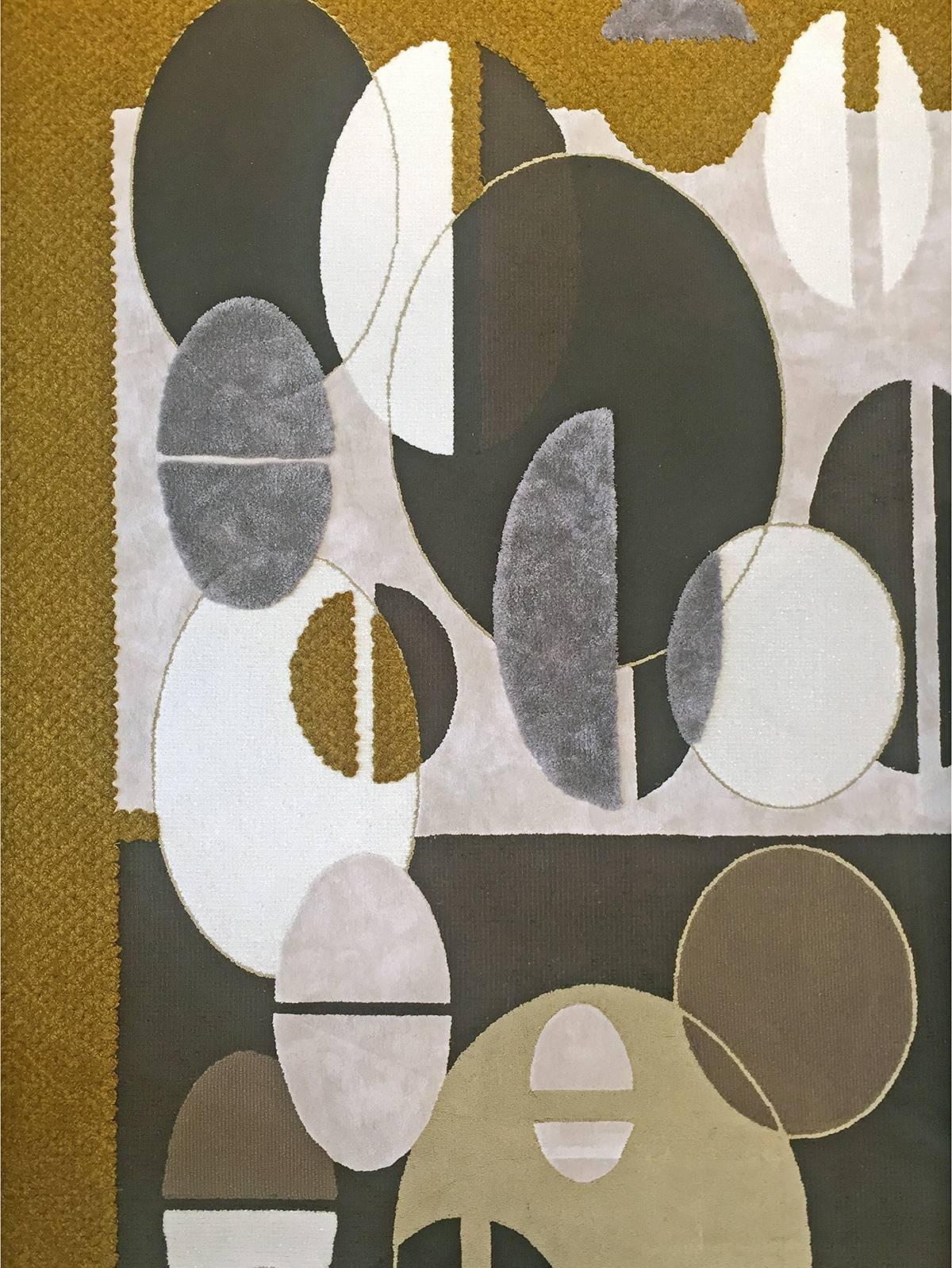 Hand tufted tactile rug, featuring circular shapes, layering of textures and bold colours inspired by our antiques collection. Only the finest quality silks, wool, lurex and silver yarns have also been used to produce these rugs, which are highly