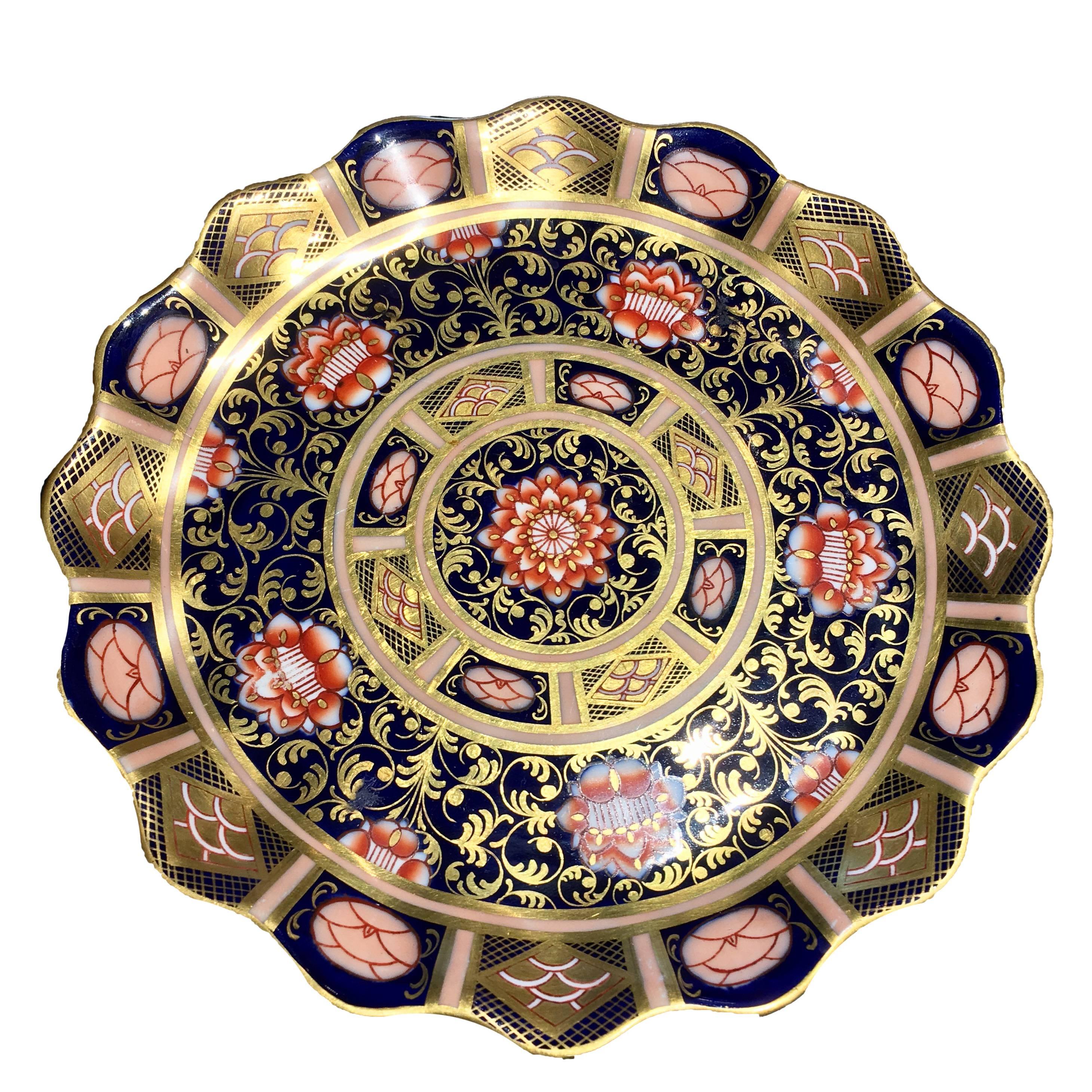 Hand-painted in rich gold, dark blue and a reddish orange, the exotic Imari pattern with its oriental air has always been one of Wedgwood's most sought after designs.

Stylish, elegant and in perfect antique condition. Highly collectable.

Each