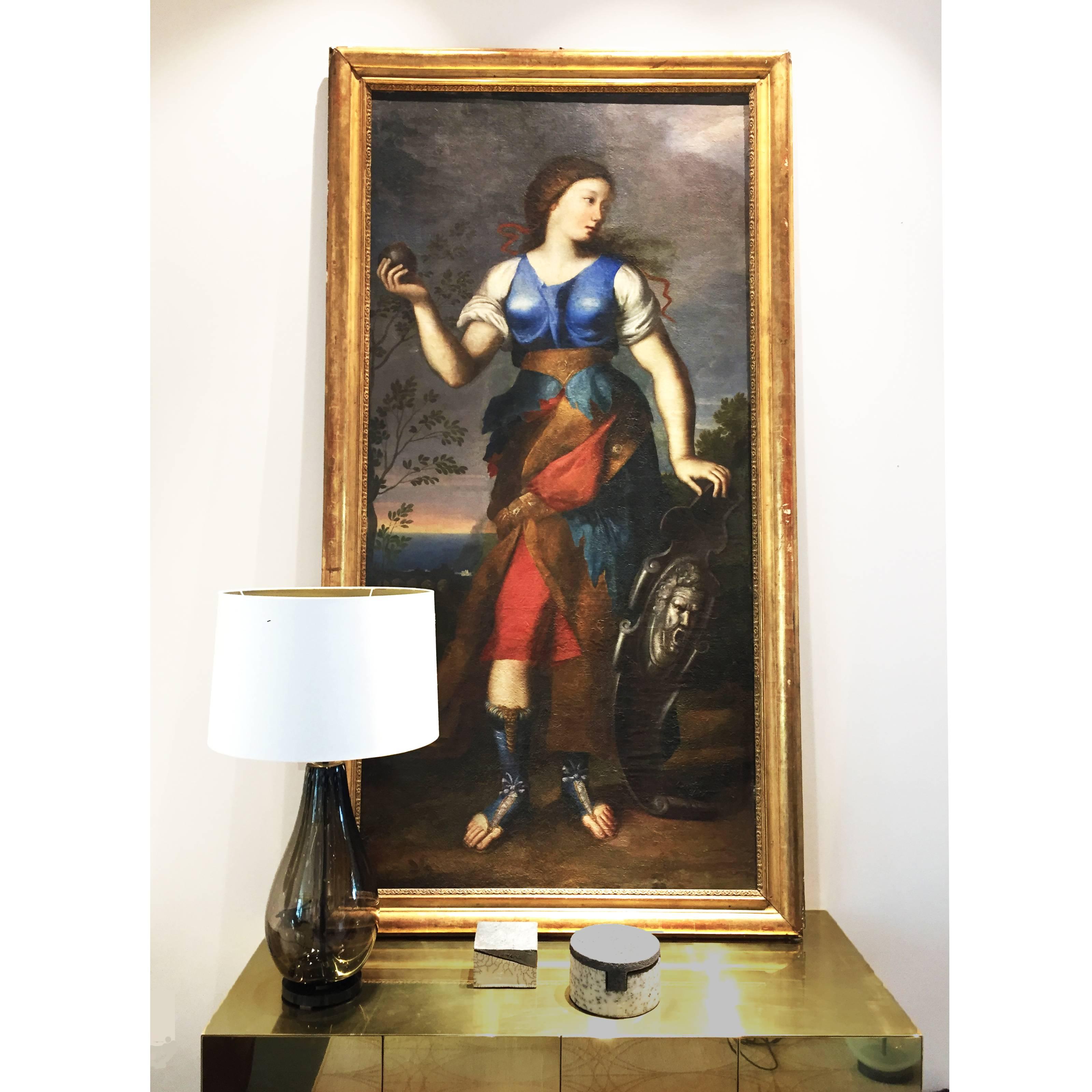 Powerful renaissance oil painting on canvas from late-1600's, featuring Bellona the goddess of war. The painting is skilfully created using oil paints to create movement and texture on its surface, painted by an Italian artist from Emilian School -