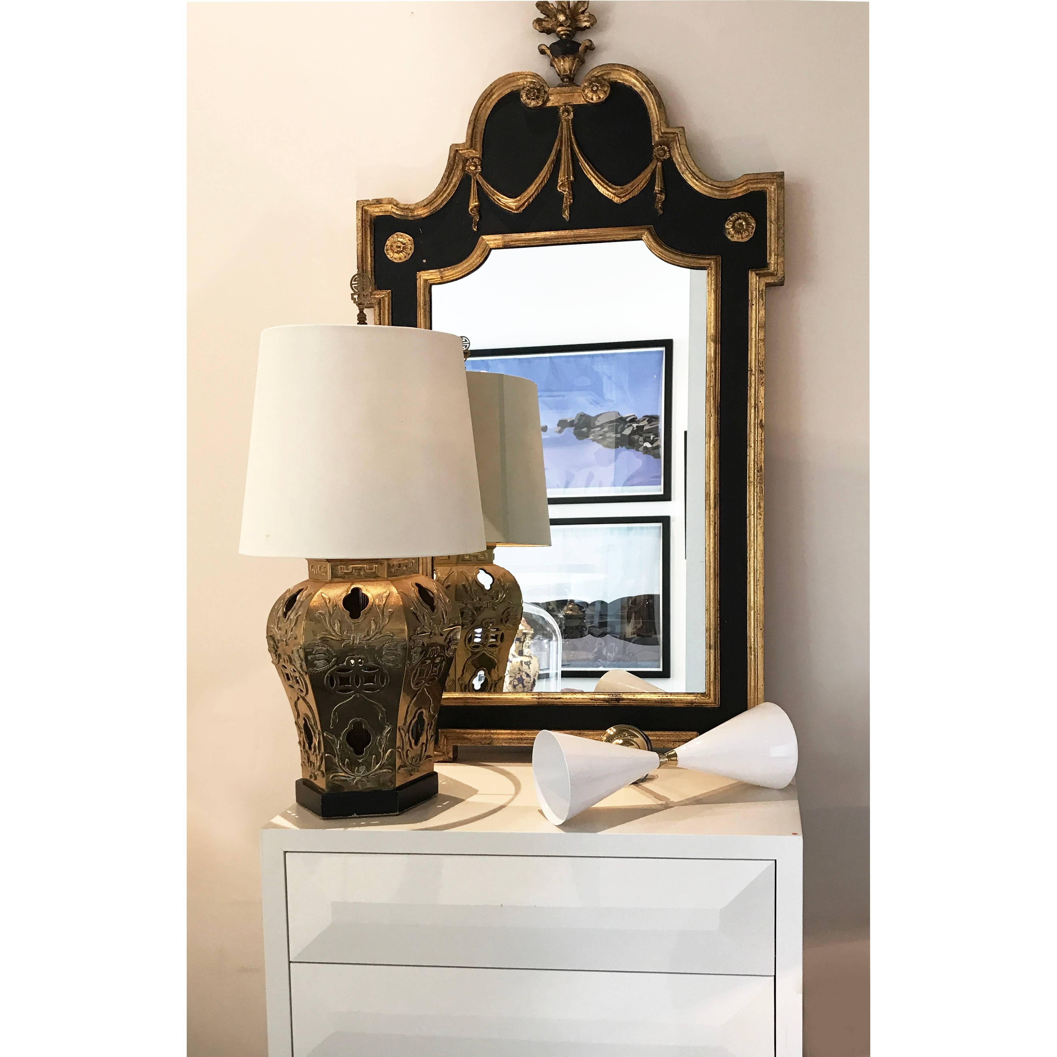 1940s American Hollywood Regency mirror from Miami. Wooden frame with carved gold detailing and original mirror. Mirror can be hung or rest on a surface. 

W70 x H145 x D4 cm

Good vintage condition.