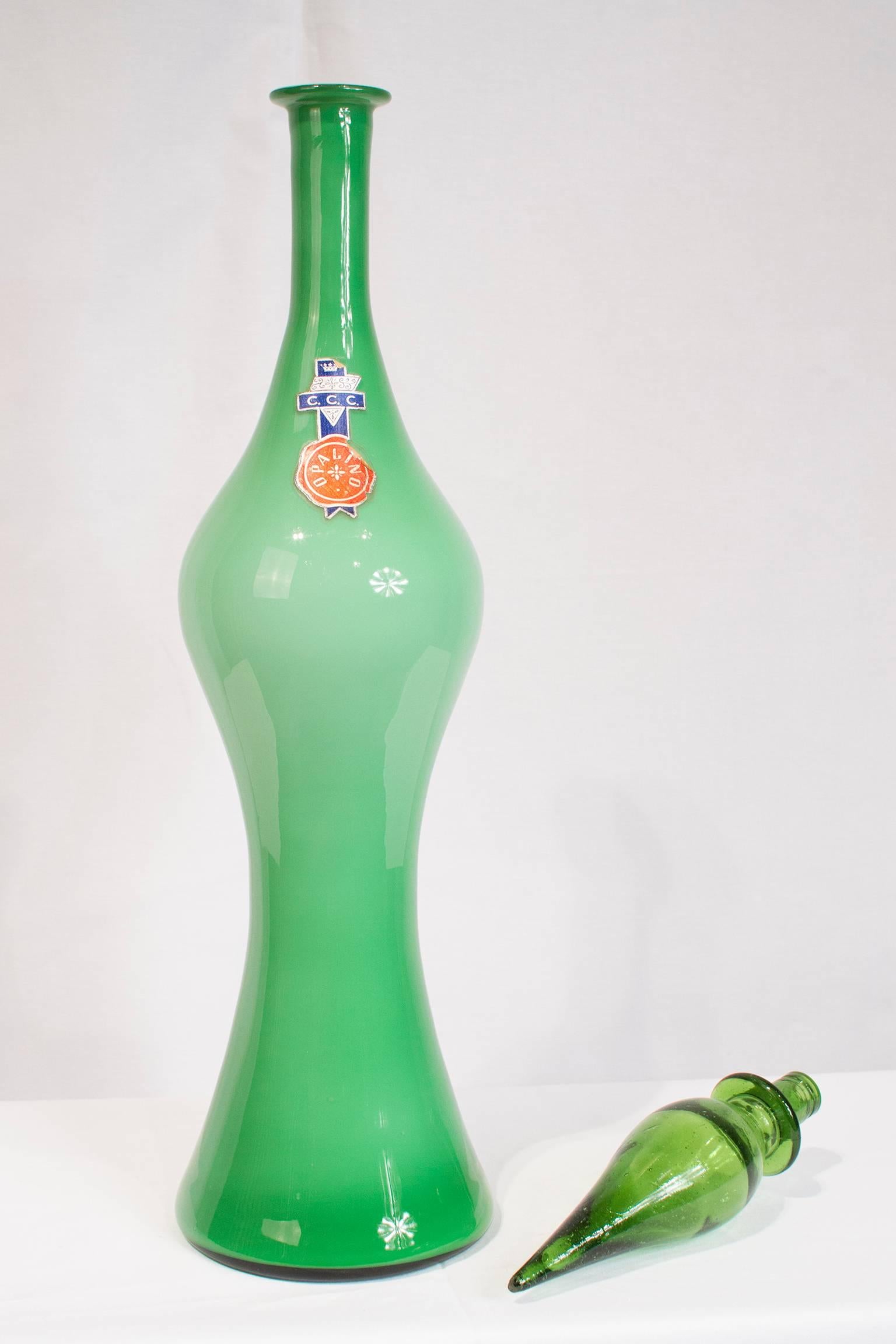Italian Empoli art glass decanter with stopper from the mid-20th century. Excellent condition.

Please look at our storefront page to browse our entire collection.
Please contact us for delivery details.