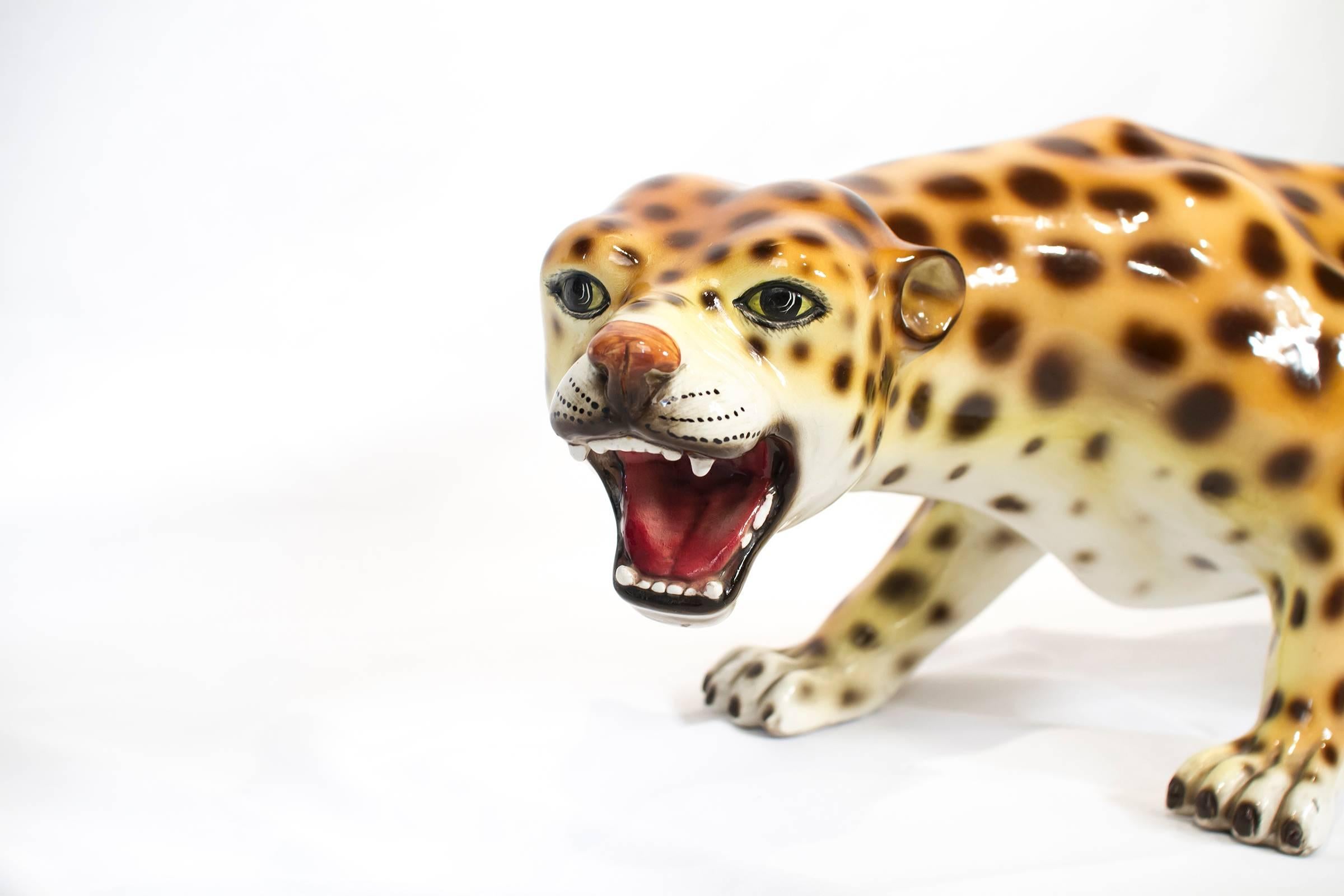 Marvelous and rare Italian cheetah ceramic sculpture in attack position, 1970s.

Please look at our storefront page to browse our entire collection.
Please contact us for delivery details.