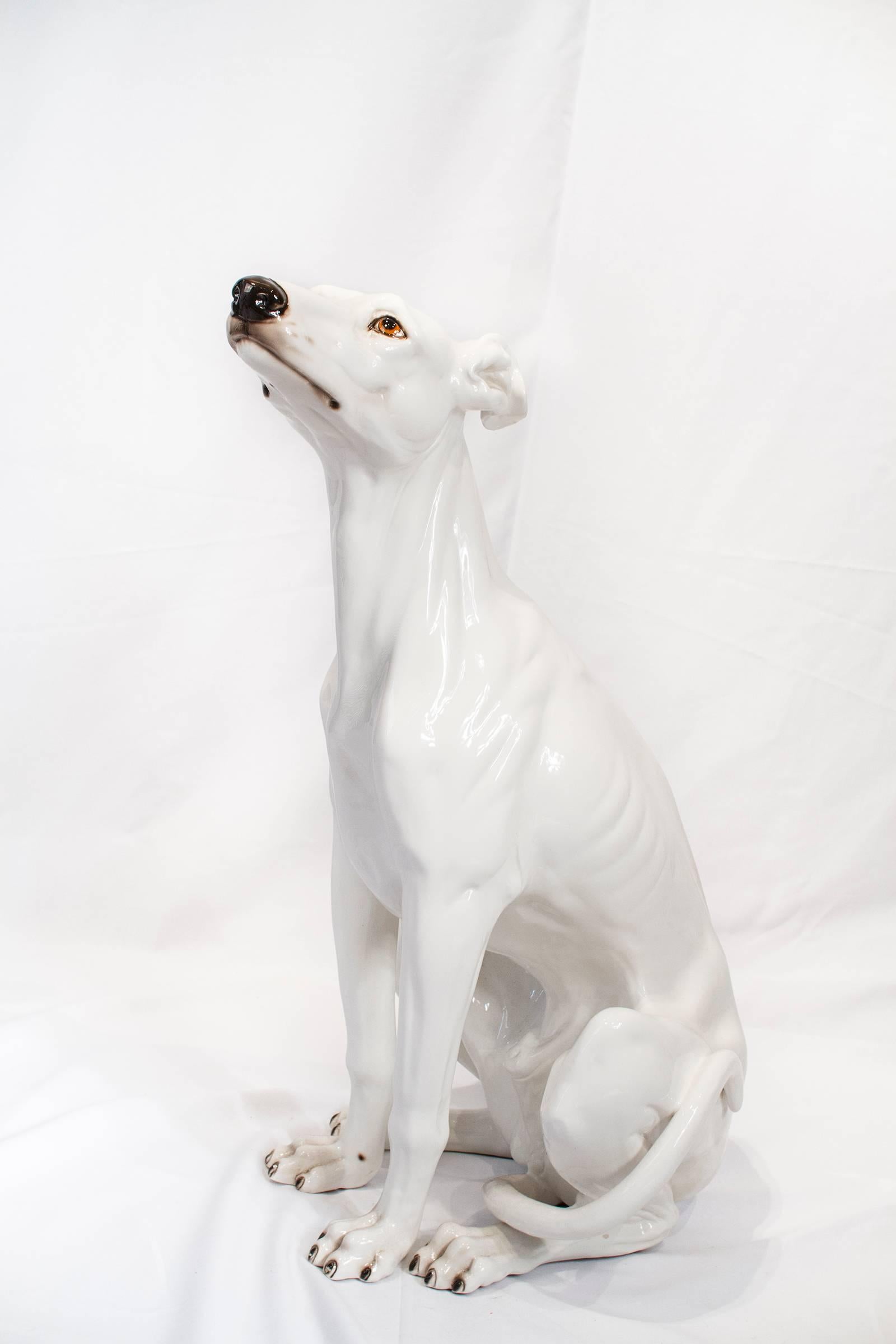 A fabulous Italian Mid-Century Modern ceramic Greyhound dog sculpture. 
Stamped underneath: Made in Italy.

Please look at our storefront page to browse our entire collection.
Please contact us for delivery details.