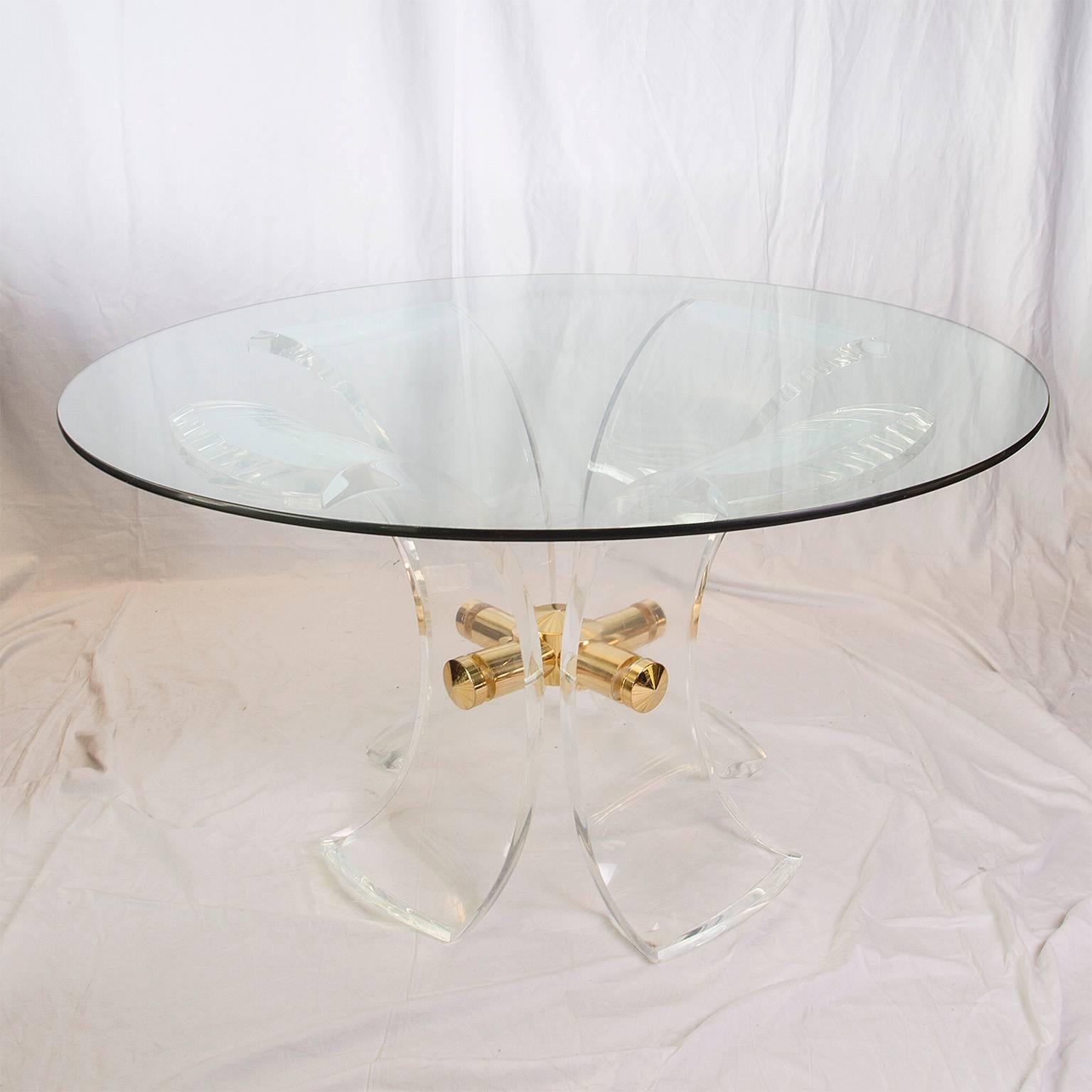 Unique lys Lucite and golden steel dining table with glass top.

Please contact us for delivery details.