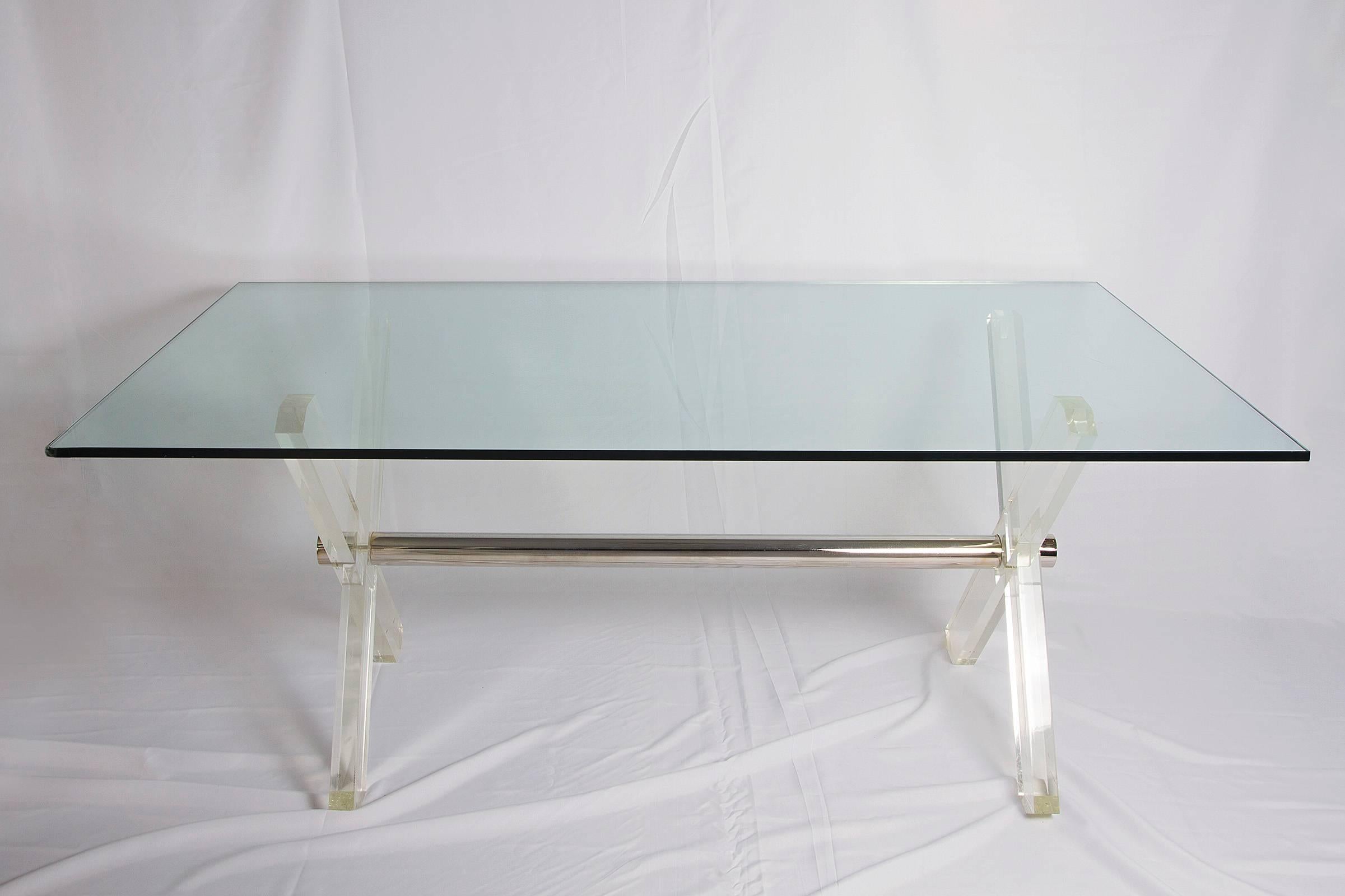Steel and Lucite X frame dining table, circa 1970s.

Please contact us for delivery details.