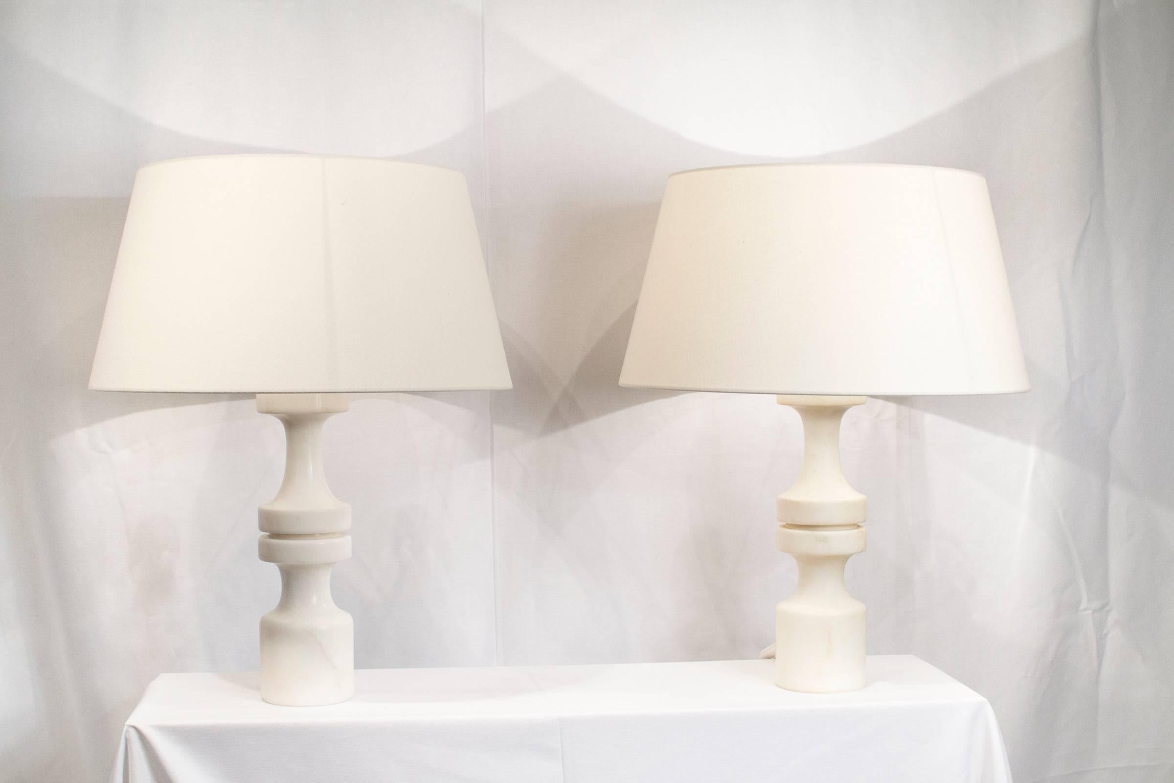 Very good looking pair of Mid-Century Italian alabaster lamps. One of the two lamps has a slightly more yellow tone. Shades not included.

Please contact us for delivery details.