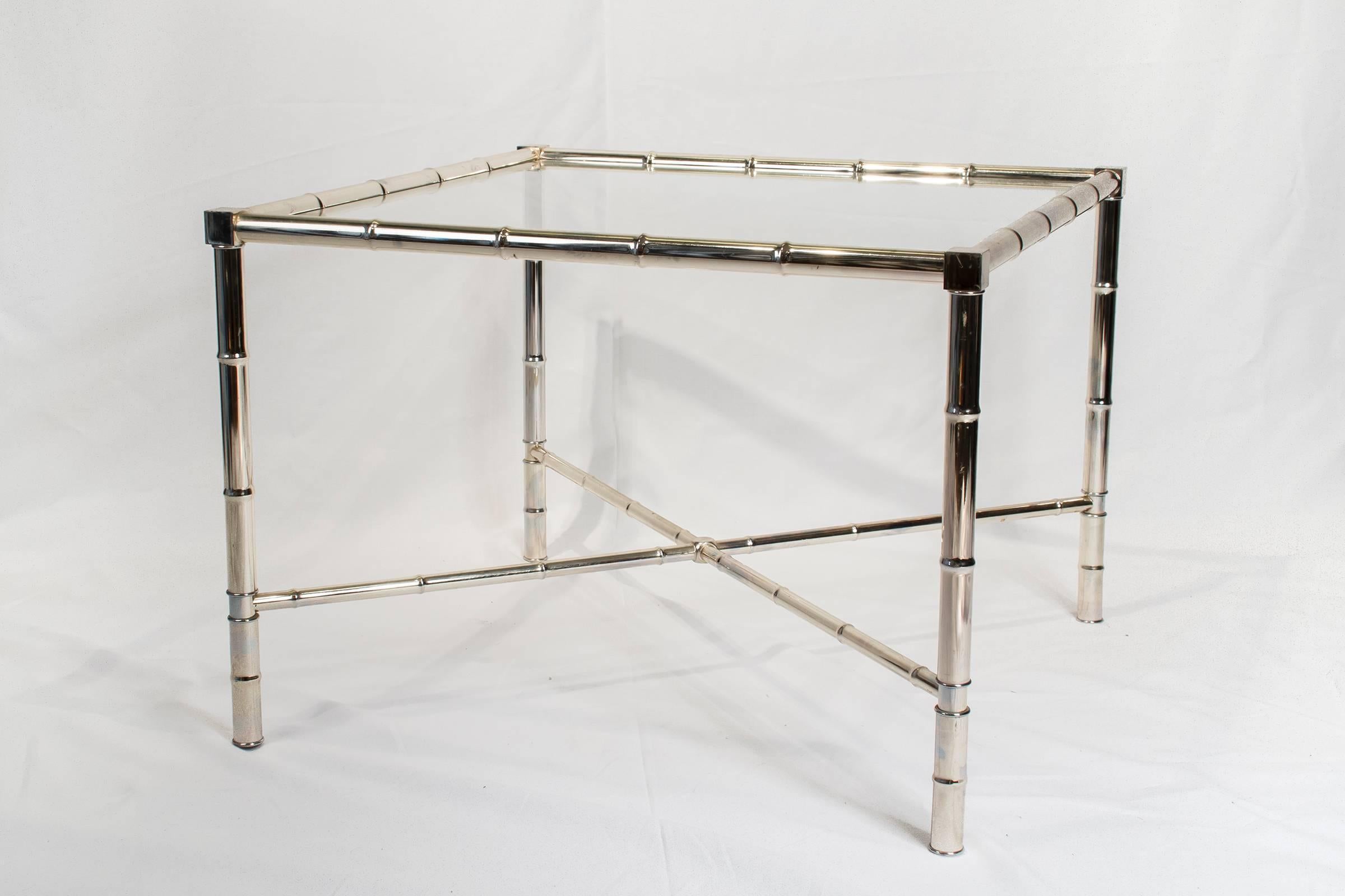 Lovely Hollywood Regency chrome and glass table with Classic X-base. This would fit in with any Hollywood Regency or Mid-Century Modern decor.


 