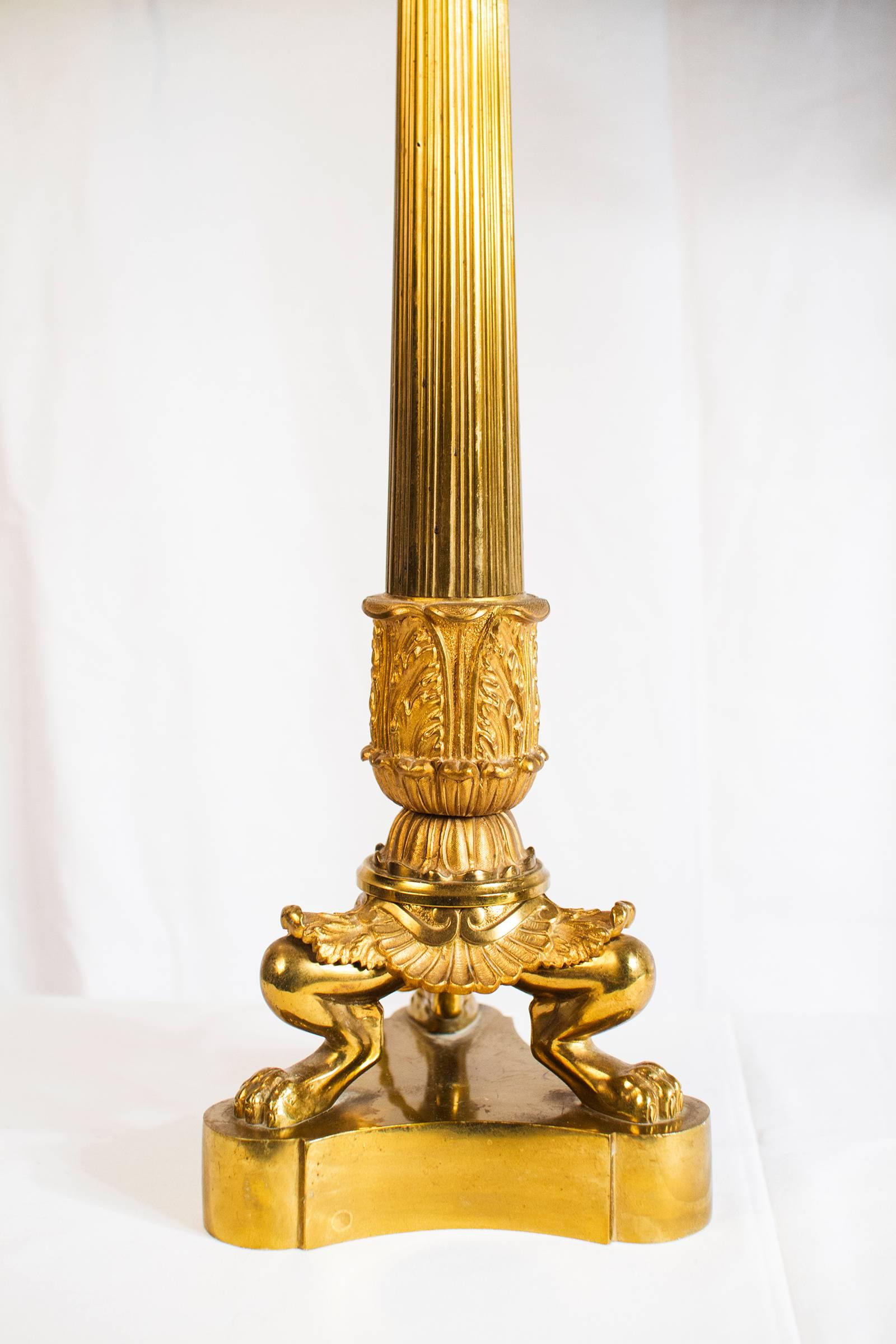 Brass Grand Ensemble of Empire Style Triple Lion Paw Gilded Table Lamps