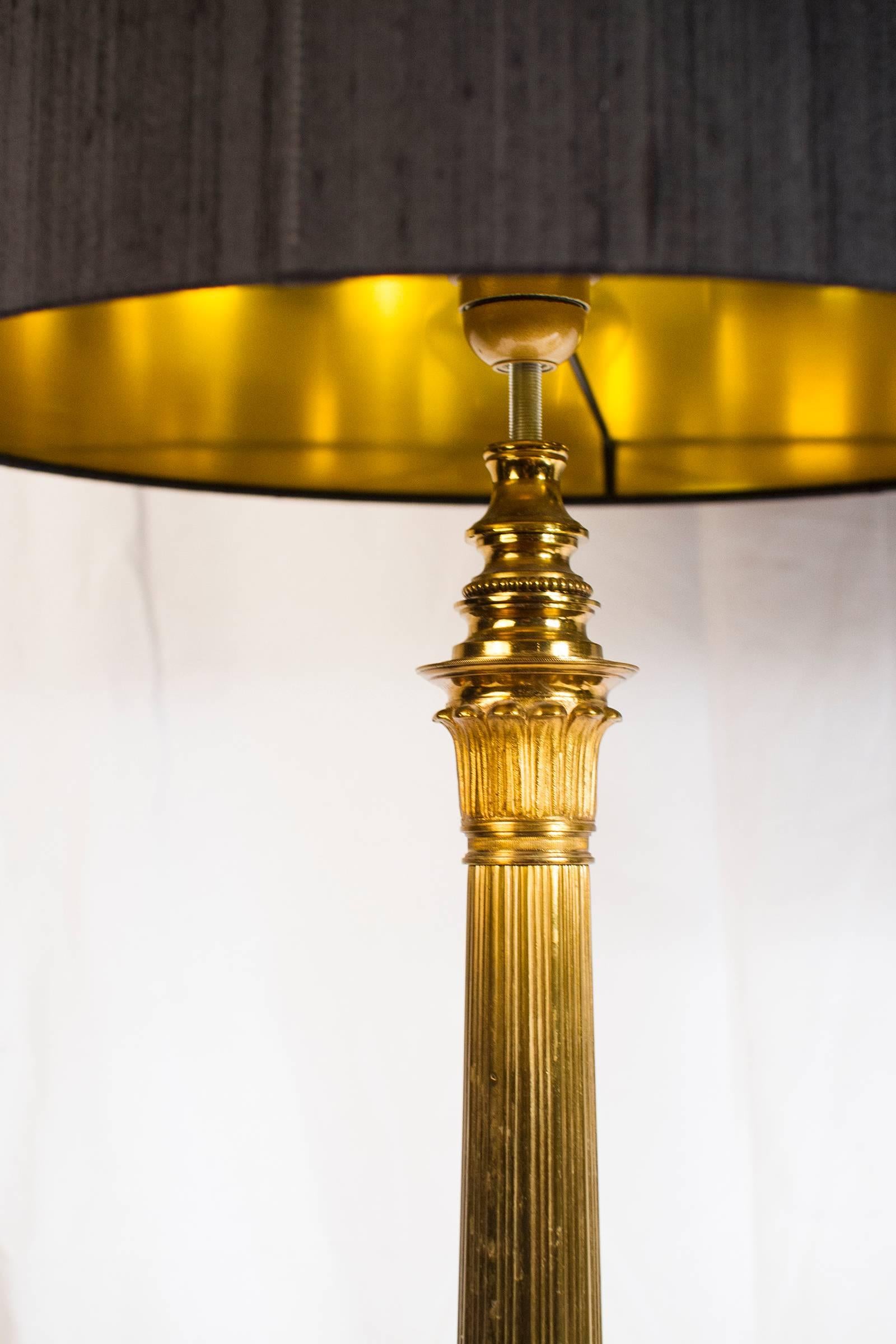 20th Century Grand Ensemble of Empire Style Triple Lion Paw Gilded Table Lamps