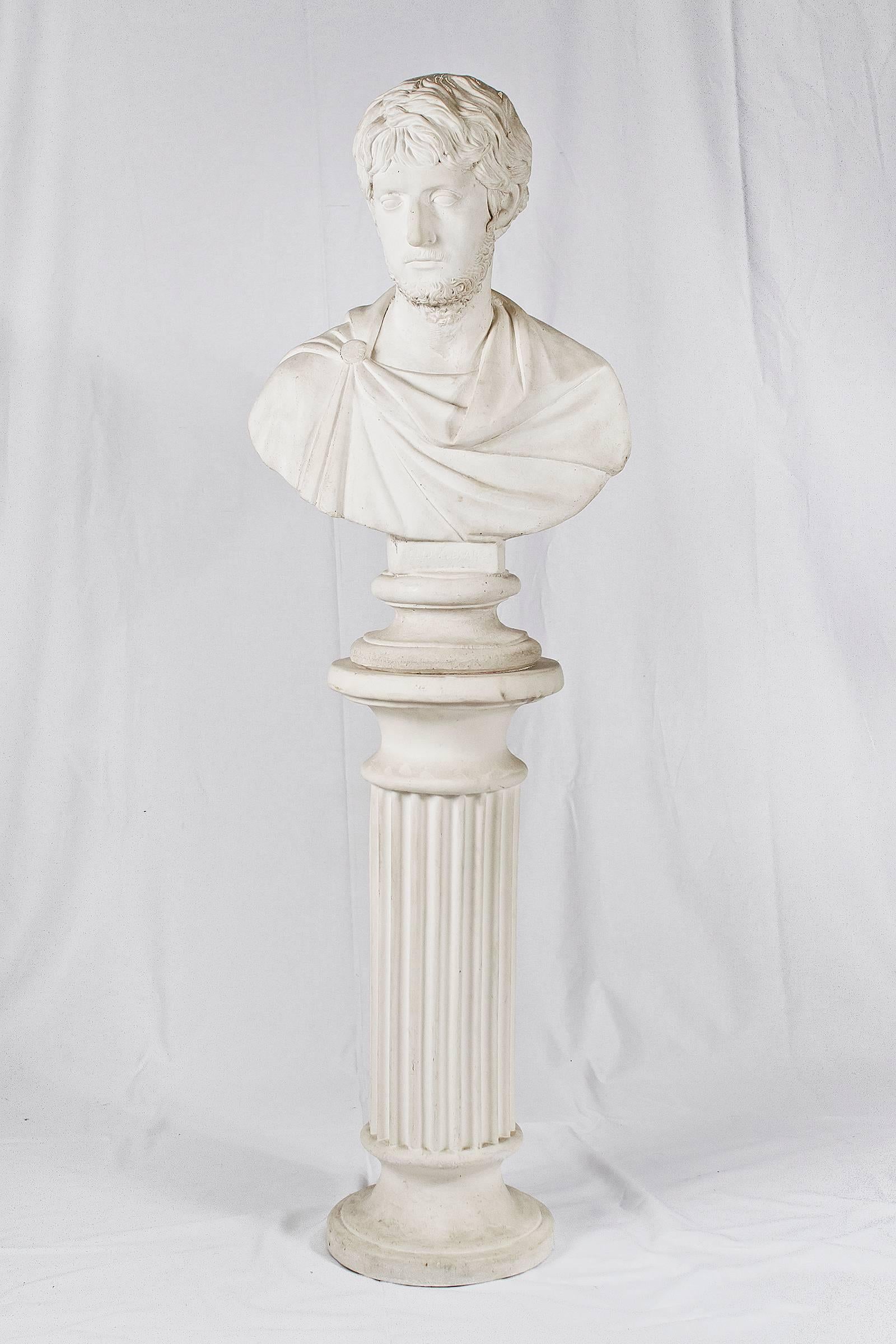 Antique concrete male bust with plaster column.

Please contact us for delivery details.