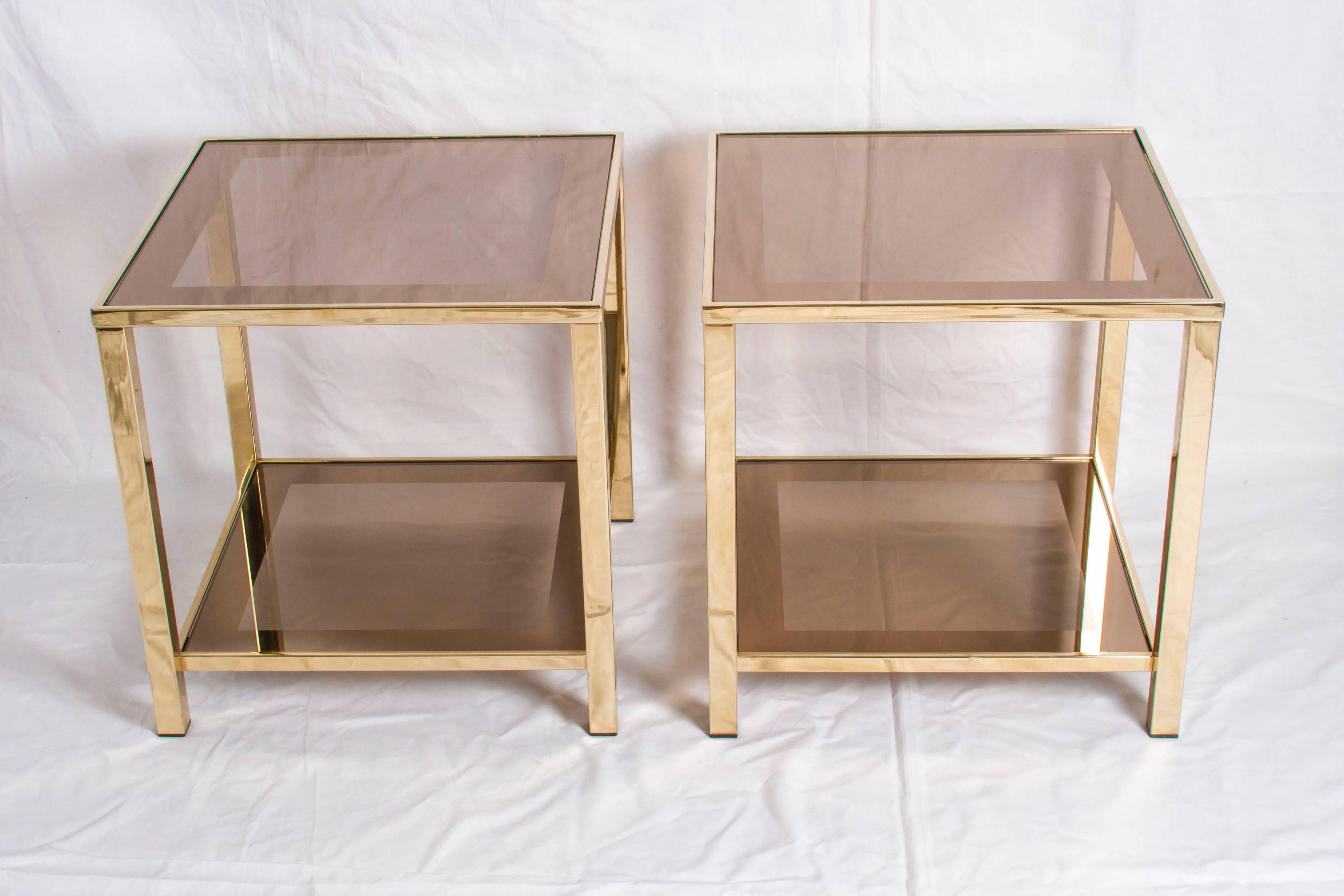 Amazing and rare 23-carat gold-plated set of two side tables with copper mirror tops by Belgo Chrome.

Please contact us for delivery details.