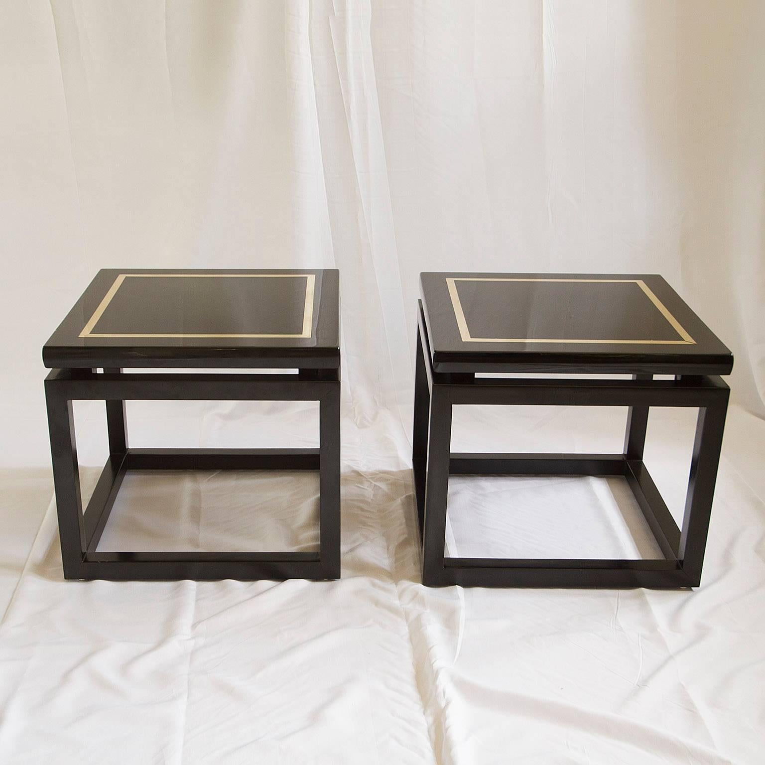 Beautiful pair of side tables in black lacquer and brass. French.