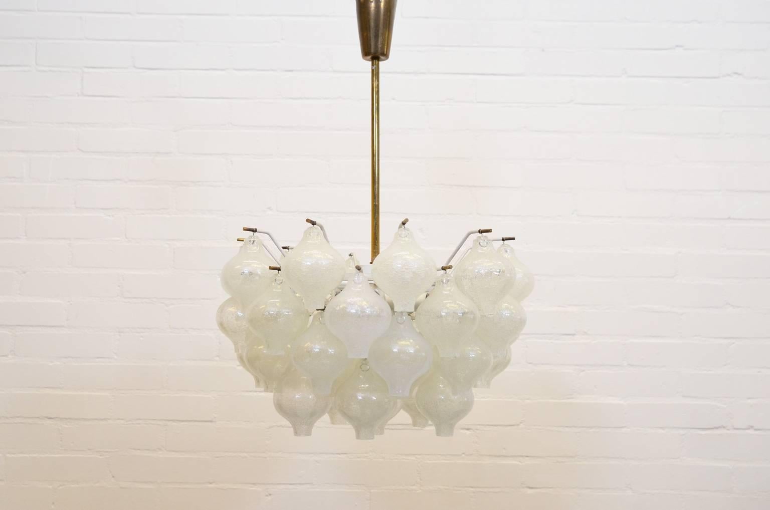 Beautiful shaped chandelier with 41 handblown glass spheres hanging on a white metal frame. Thanks to the ten light bulbs covered by the glass elements the lamp spreads a beautiful light and shadow on wall or ceiling.