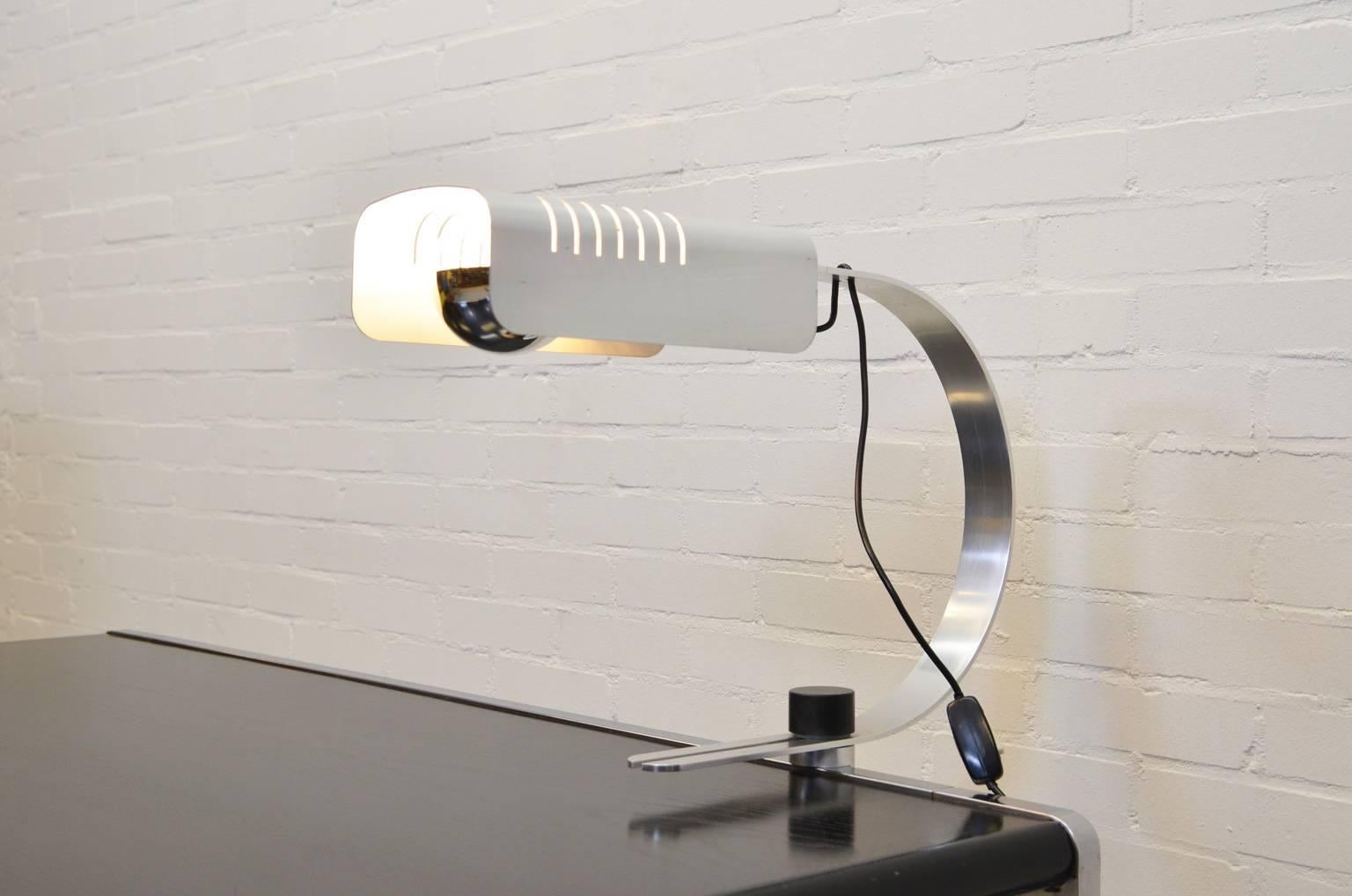 Beautifully designed lamp, elegant lines and nice details. An eye-catcher on your desk or table. The lamp can be attached to your table or desk with a black, plastic screw. 