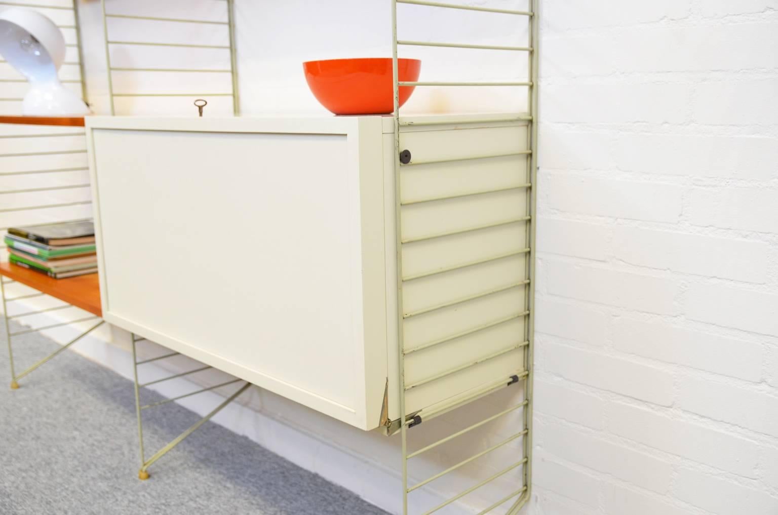 String Wall System with by Nisse Strinning for String Design