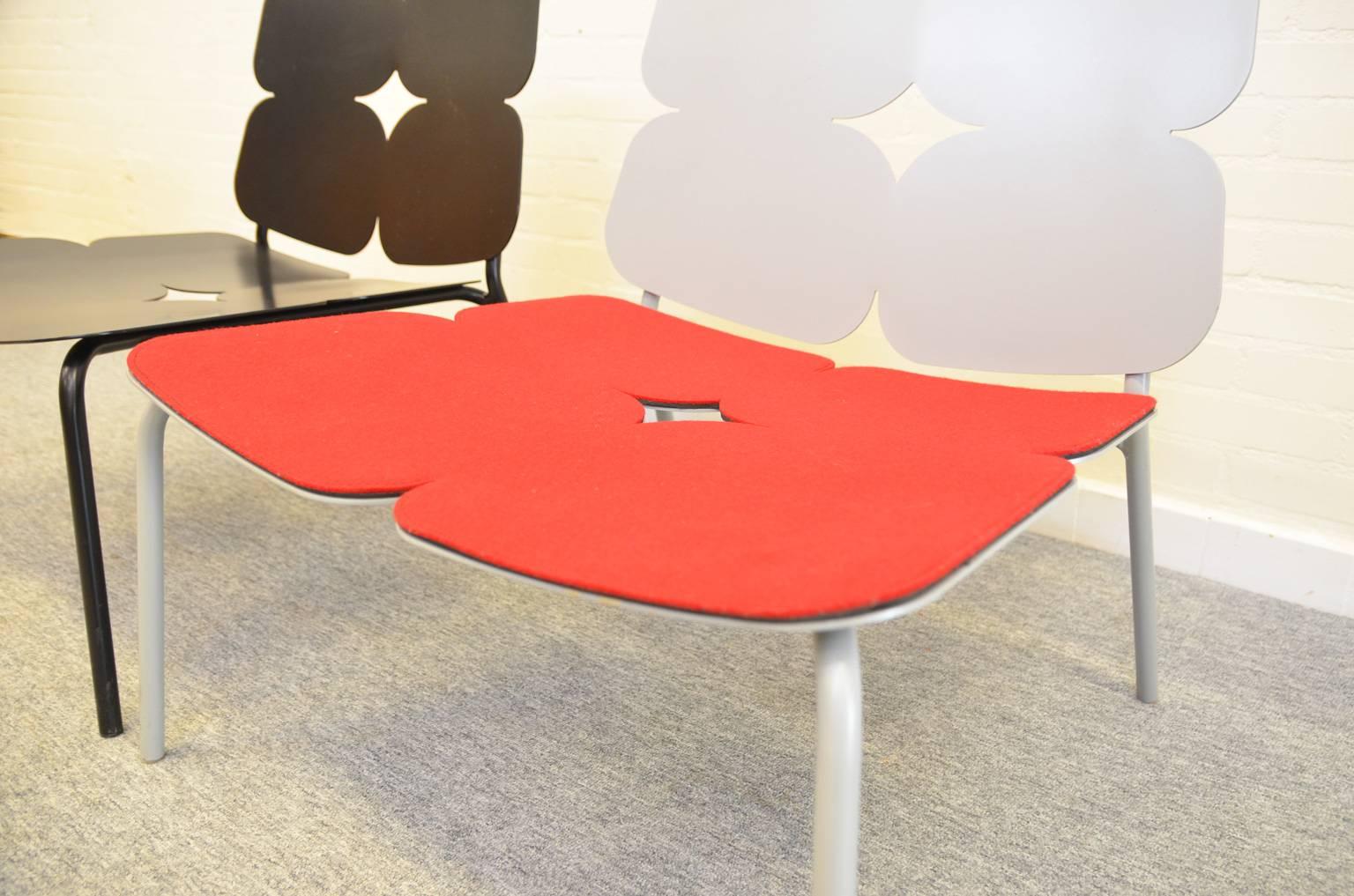 This easy chair was produced as a limited edition by Italian firm Bart Design (ceased in 2006). The red felt cushion is optional (there is only one available).