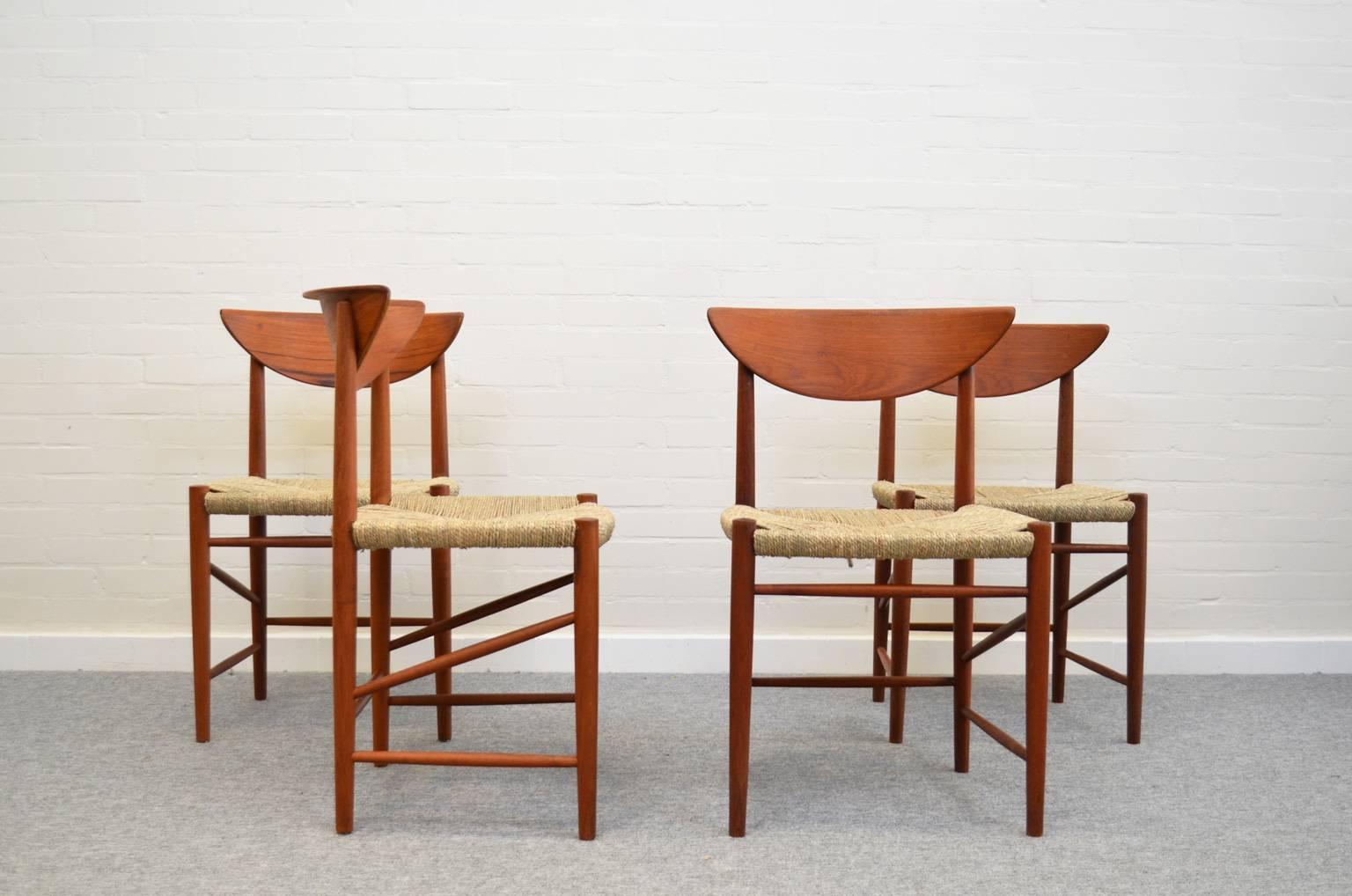 Unique mid-century Danish dining chairs. The shape of the backrest, the crosspieces between the legs and the combination of teak and seagrass is typical for the craftsmanship of this Danish designers duo Hvidt & Mølgaard-NIlesen. 