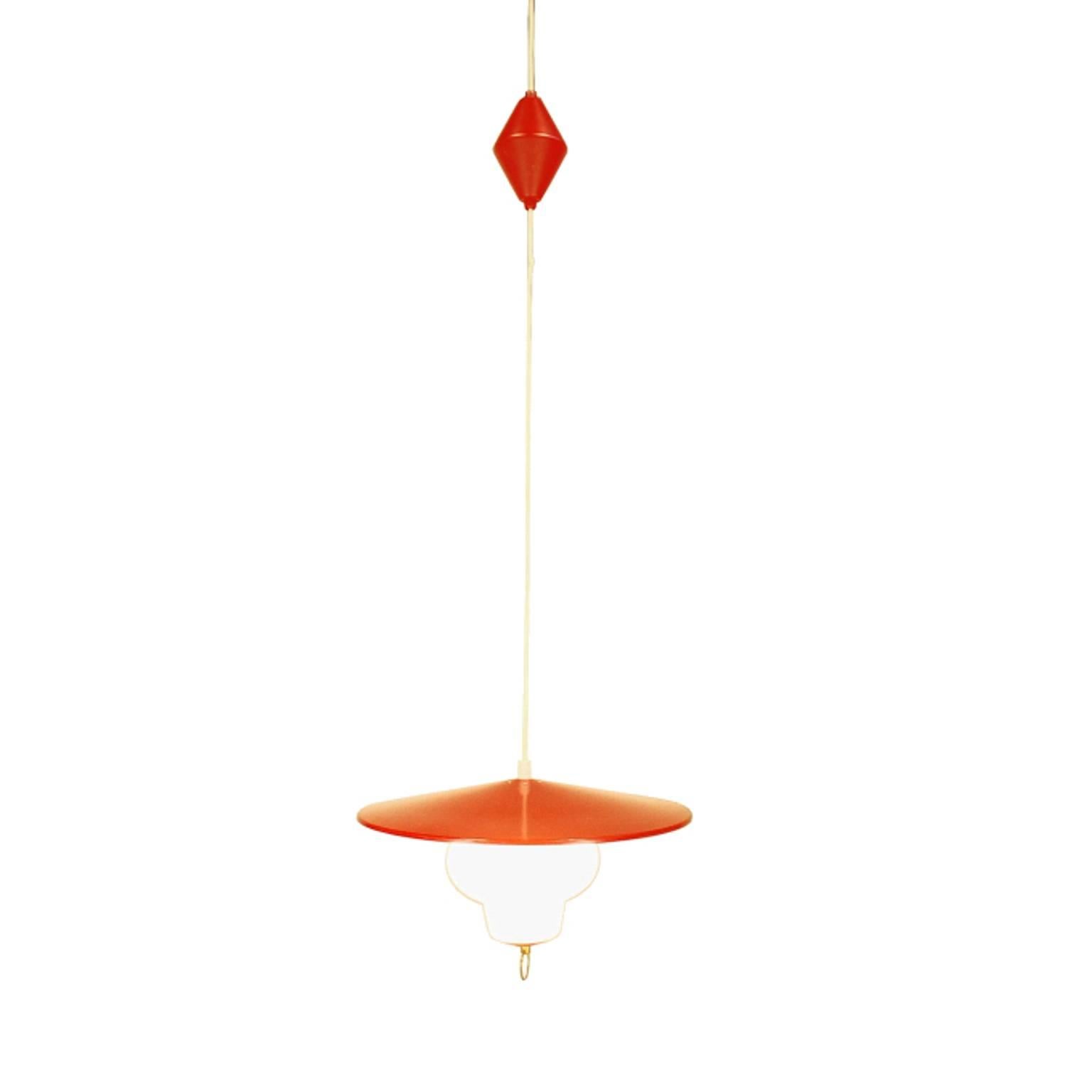 Nice pendant lamp with red lacquered metal and opal glass. The diameter is about 42 cm, the height is 26 cm. Made by the Danish company Voss who stopped producing lamps in 1968. Seeing it's age this lamp is in a very good condition. The cord is