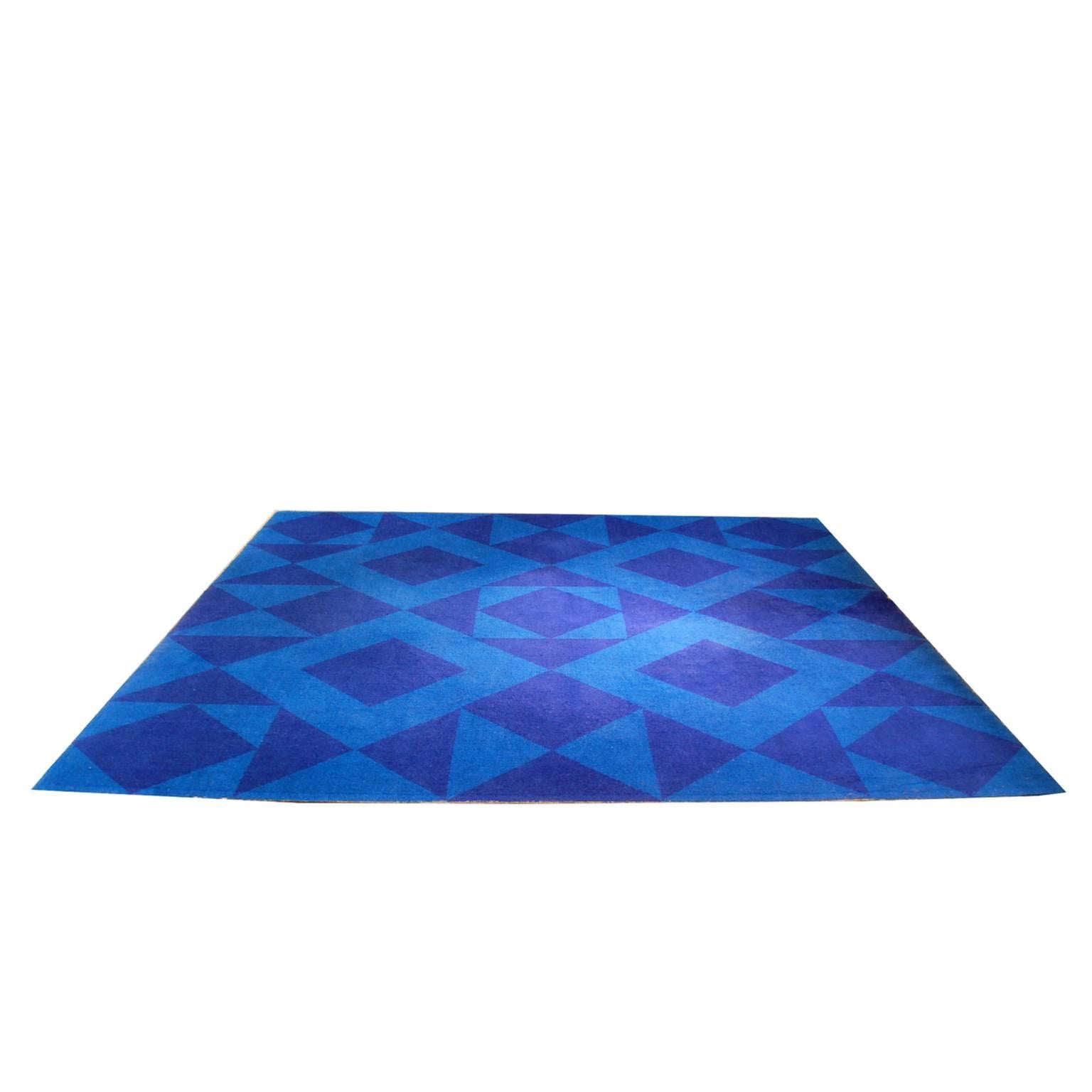 Rare and early carpet by Verner Panton. The design is called Geometri VI and was originally produced as a woolen rya carpet by Unika Vaev in Denmark. This is a synthetic wall to wall version of the same design.