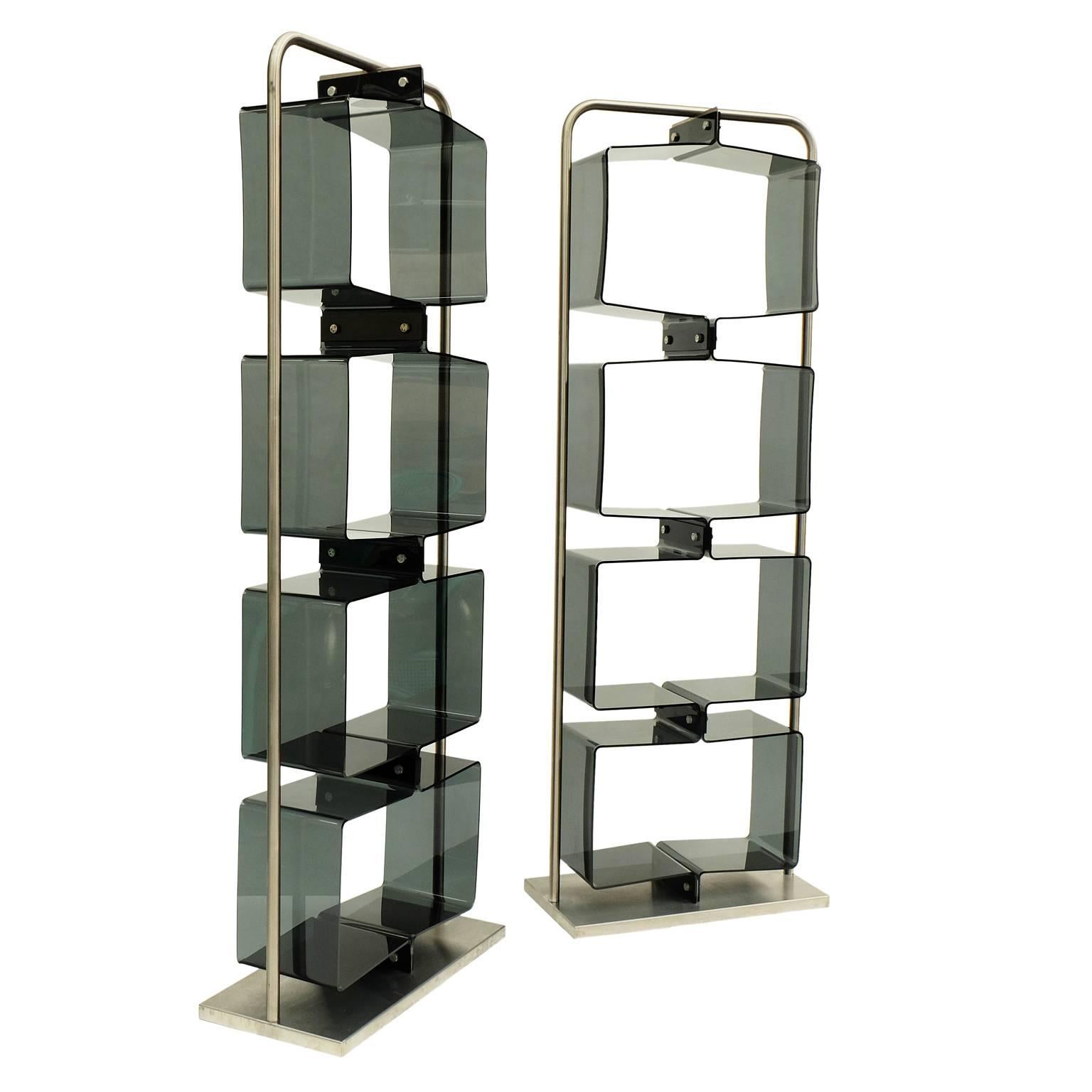Pair of 1970s shelving units designed and made in France.

Tinted Lucite with brushed steel and aluminium frames.

Measure: H 194cm x W 69cm x D 35cm.