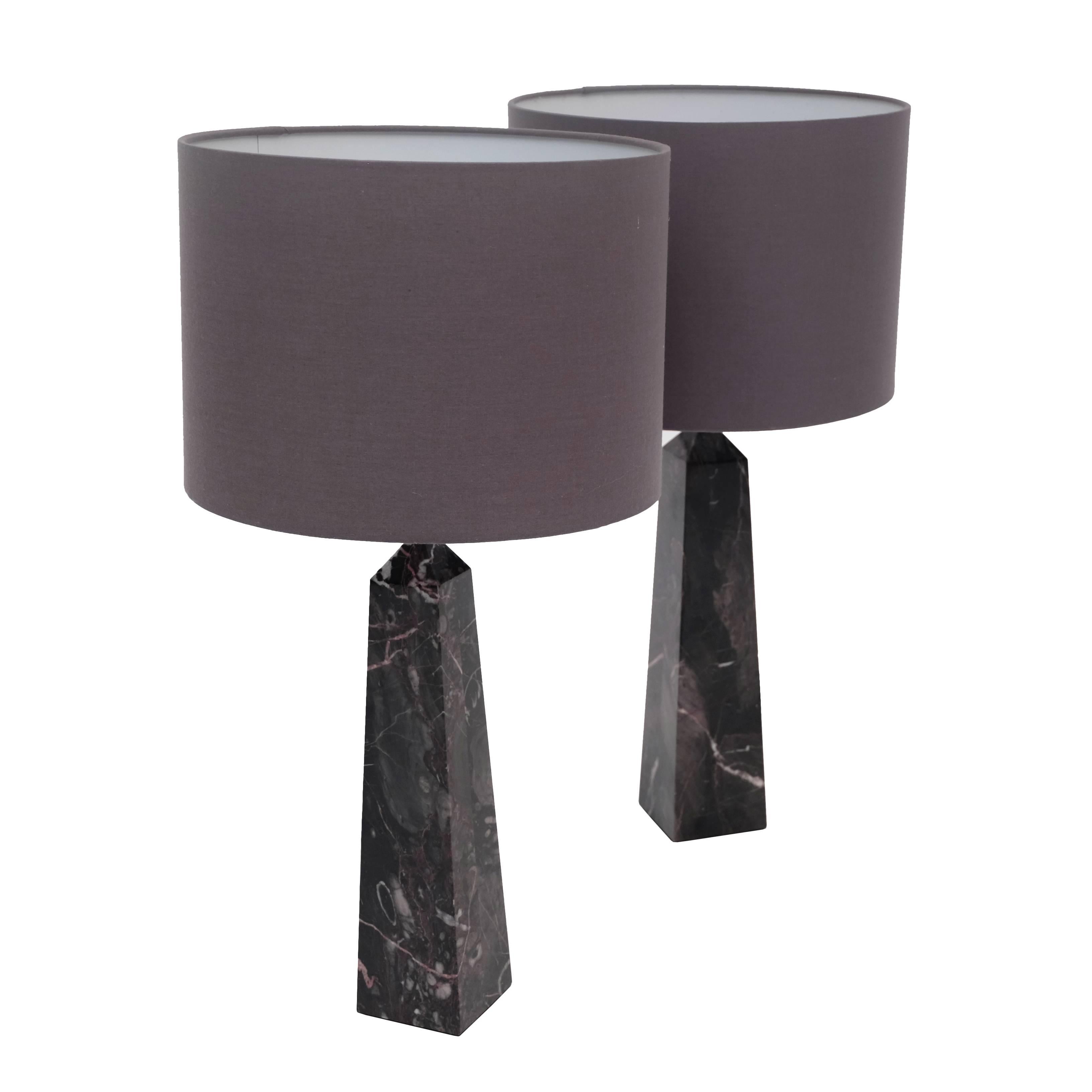 Pair of 1960s table lamps designed and manufactured in Italy.
Portoro marble obelisk bases. Grey cotton shades.

Measures: H 55cm x D 28cm.
H (without shade): 40cm x W 7.5cm.

