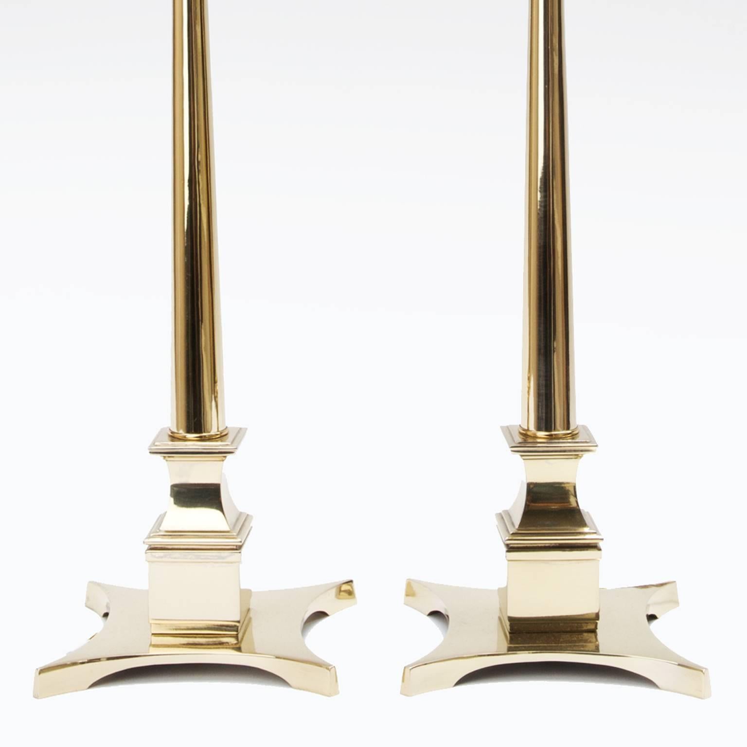 Pair of Tommi Parzinger Style Brass Lamps
Measures: 37 in. H x 7 in. W x 7 in.D 
Available as a pair
Lamp shades not included
Contact trans-LUXE for custom lamp shades

