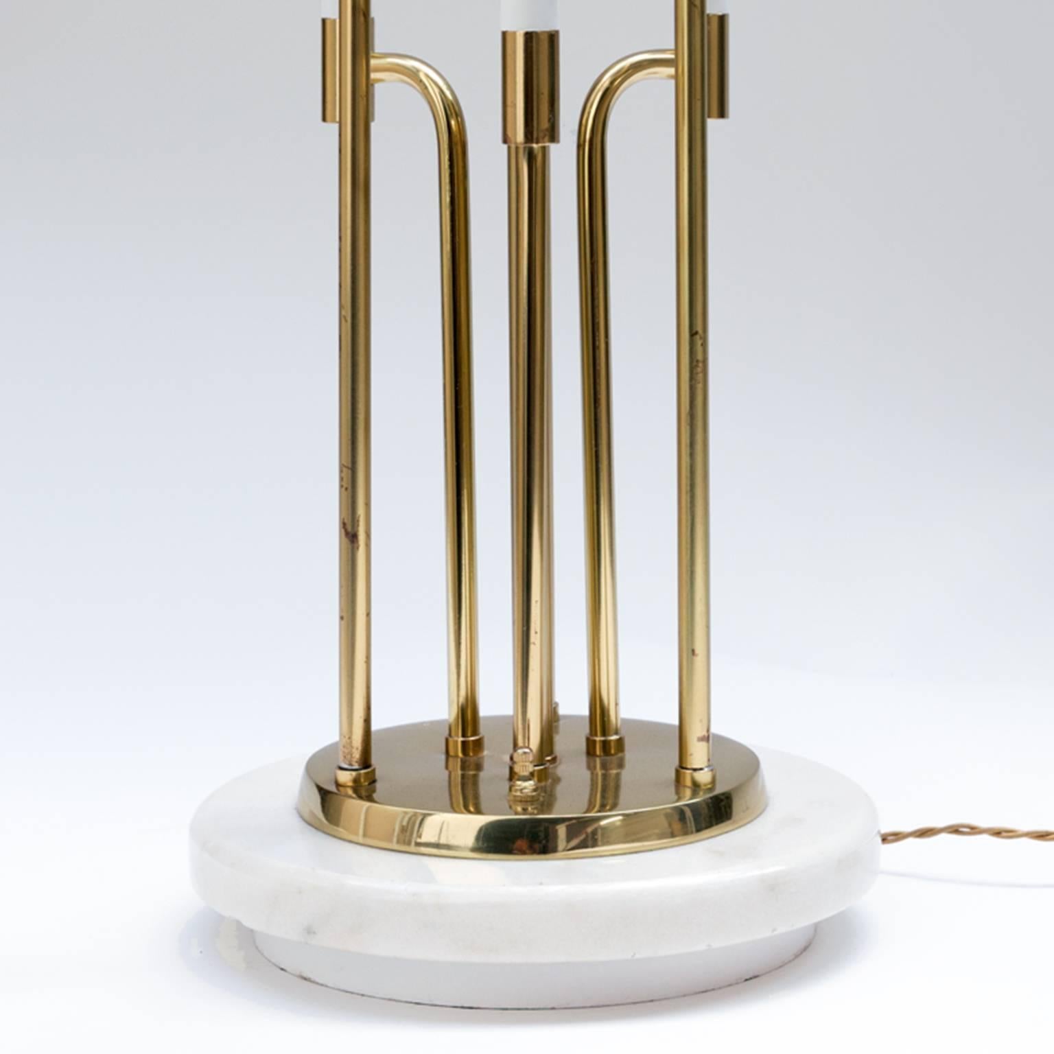 Designed by Tommi Parzinger.
Mid-Century Modern pair of brass-plated and marble base table lamps.
Each with six single sockets and finial.
Fully restored, both plating and electrical.
Shades not included.
Contact trans-LUXE for custom