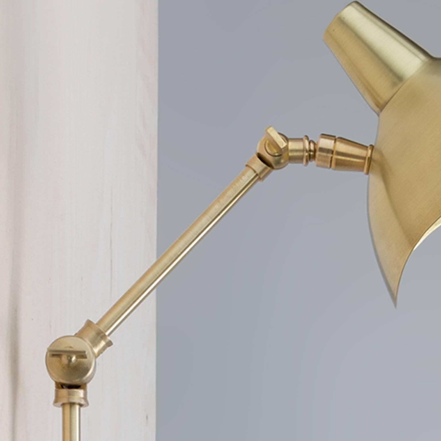 Brass swivel custom-made metal wall sconce
Brass custom work
Measures: 37” H x 7” D shade
Brass canopy: 5" D
Additional custom sizes and finishes available upon request

100% Sustainable, 100% Recyclable, Zero Child Labor, 100% Made in USA