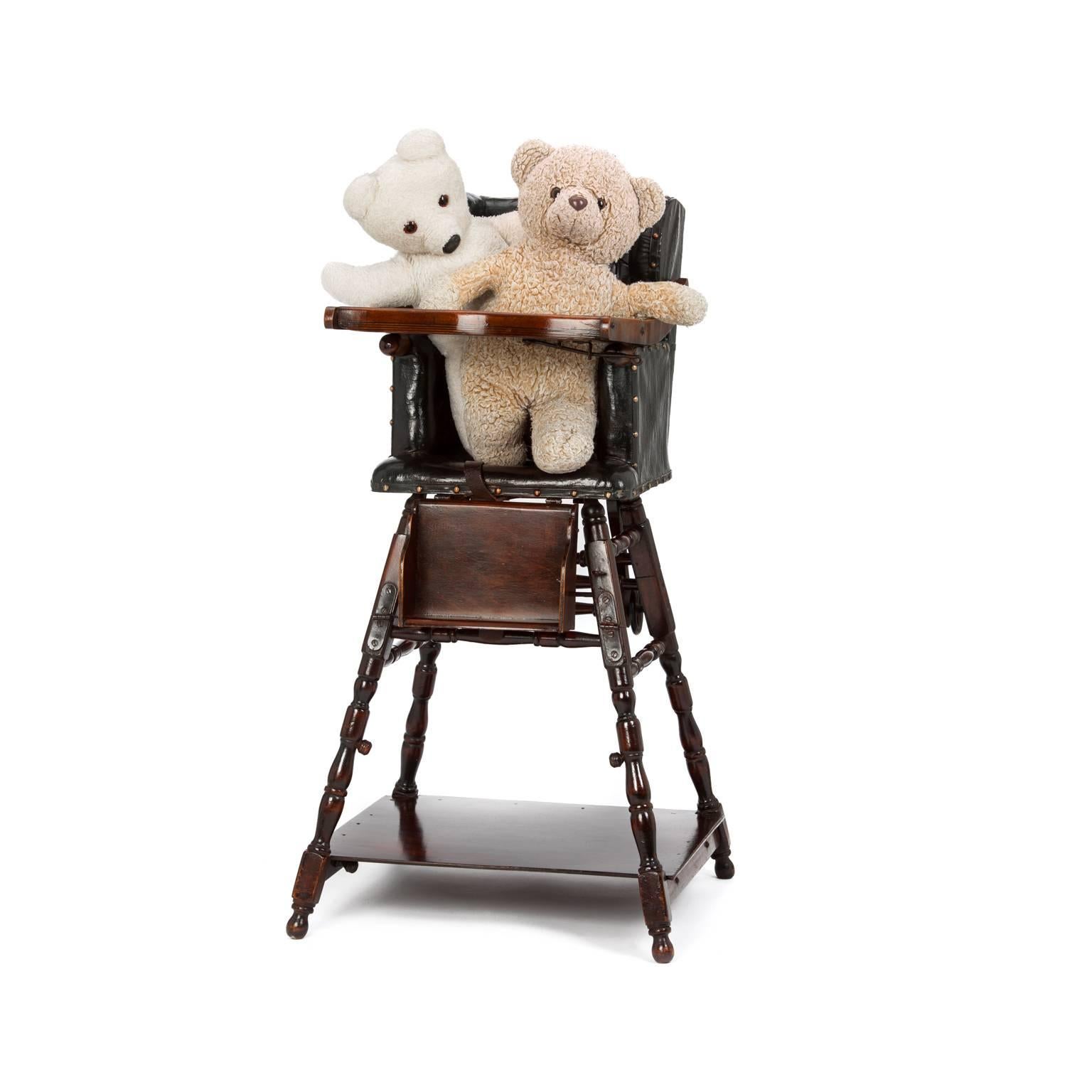 Edwardian oak child's high chair of metamorphic design, simply converts to table, high chair or an unusual Abacus learning table.

Hinged tabletop allows easy access, original leather harness, foldable crumb tray and original 'Potty'