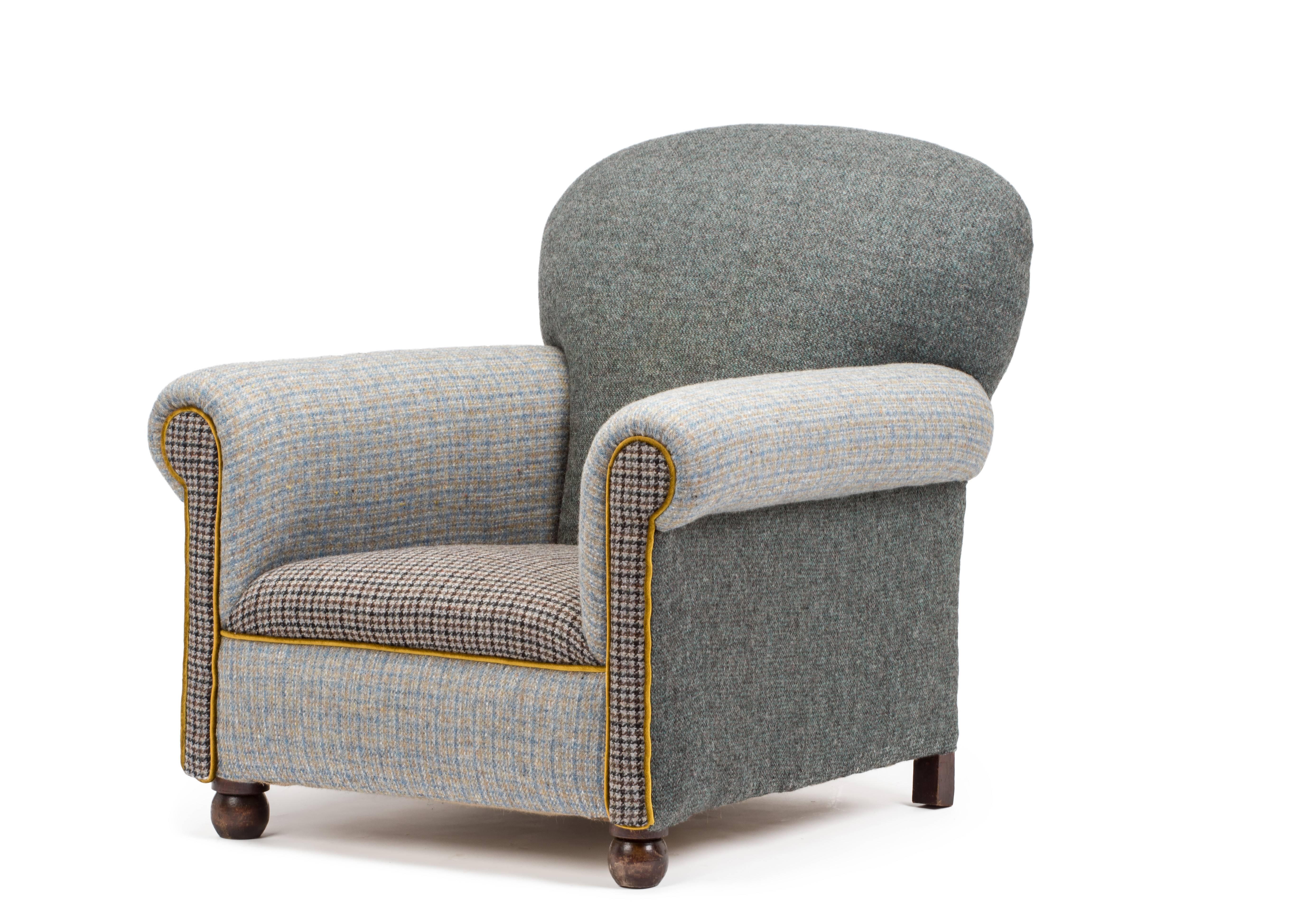 Stylish and unusual Victorian club chair traditionally reupholstered in a cocktail of Harris Tweed with acid yellow piped accent.

Resting on original bun feet.

Complete with a pair of matching scatters cushions.

Finished off with the