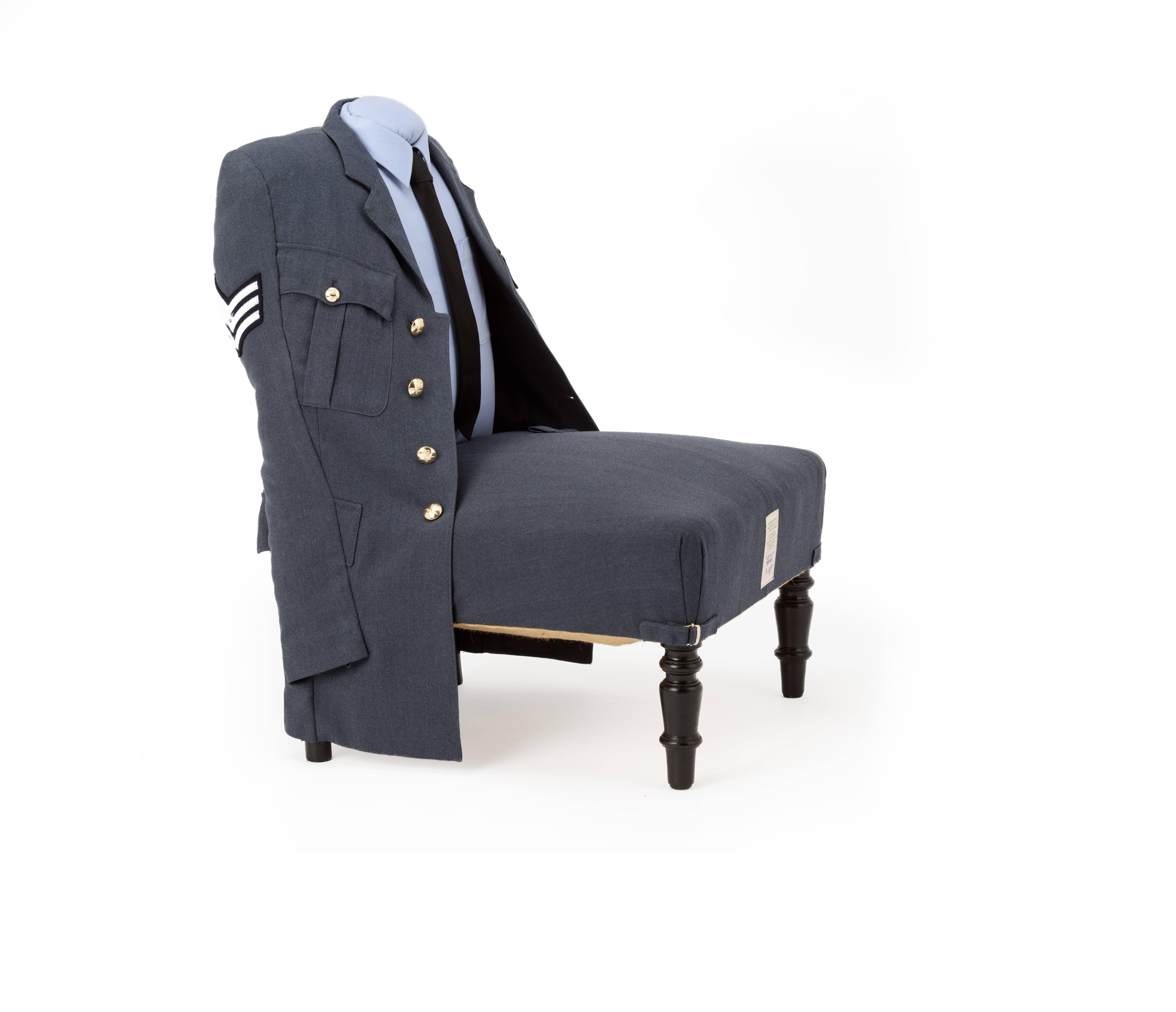 Delightful little late Victorian mahogany hall chair with turned blackened enamel hand-painted legs. Taking an original and complete RAF uniform once worn by 'Gunner Logan' acquired from the daughter of previous proud wearer we have created this