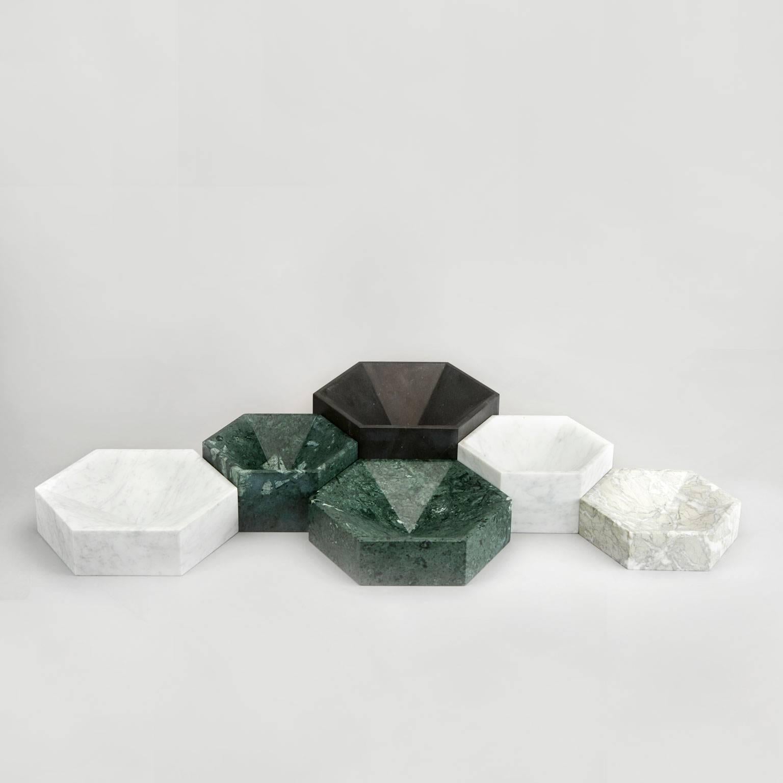 The hexagonal bowls are designed so that they can be laid together forming a honeycomb formation, either in same colour or in different colour combinations. 

Please note that no two marbles are alike and there will be variations in the pattern as