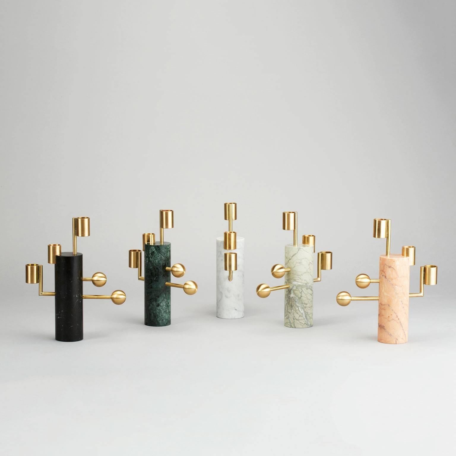 A beautiful union of brass and marble, the ‘Stargazer’ candleholders are inspired by orreries - mechanical models of the solar system used since classical times. Available in two designs, these candlesticks have a powerful sculptural presence far