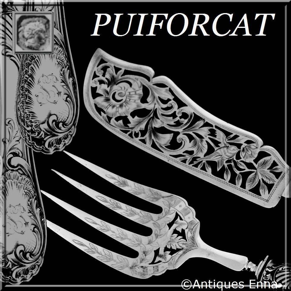Puiforcat French sterling silver fish servers set of two pieces Rococo.

Head of Minerve 1 st titre on the handles for guarantee 950/1000 French sterling silver. The upper part of the fish servers are silver plated.

The handle has fantastic