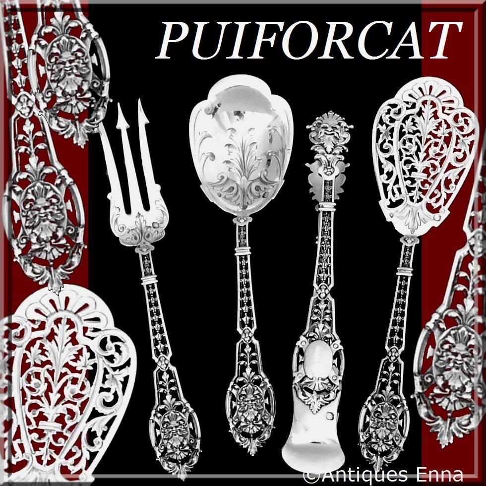 Puiforcat masterpiece French all sterling silver dessert set of four pieces Mascaron.

An exceptional set from the point of view of its design as well as the quality of the engraving. The sophistication of this design and the open work handles are