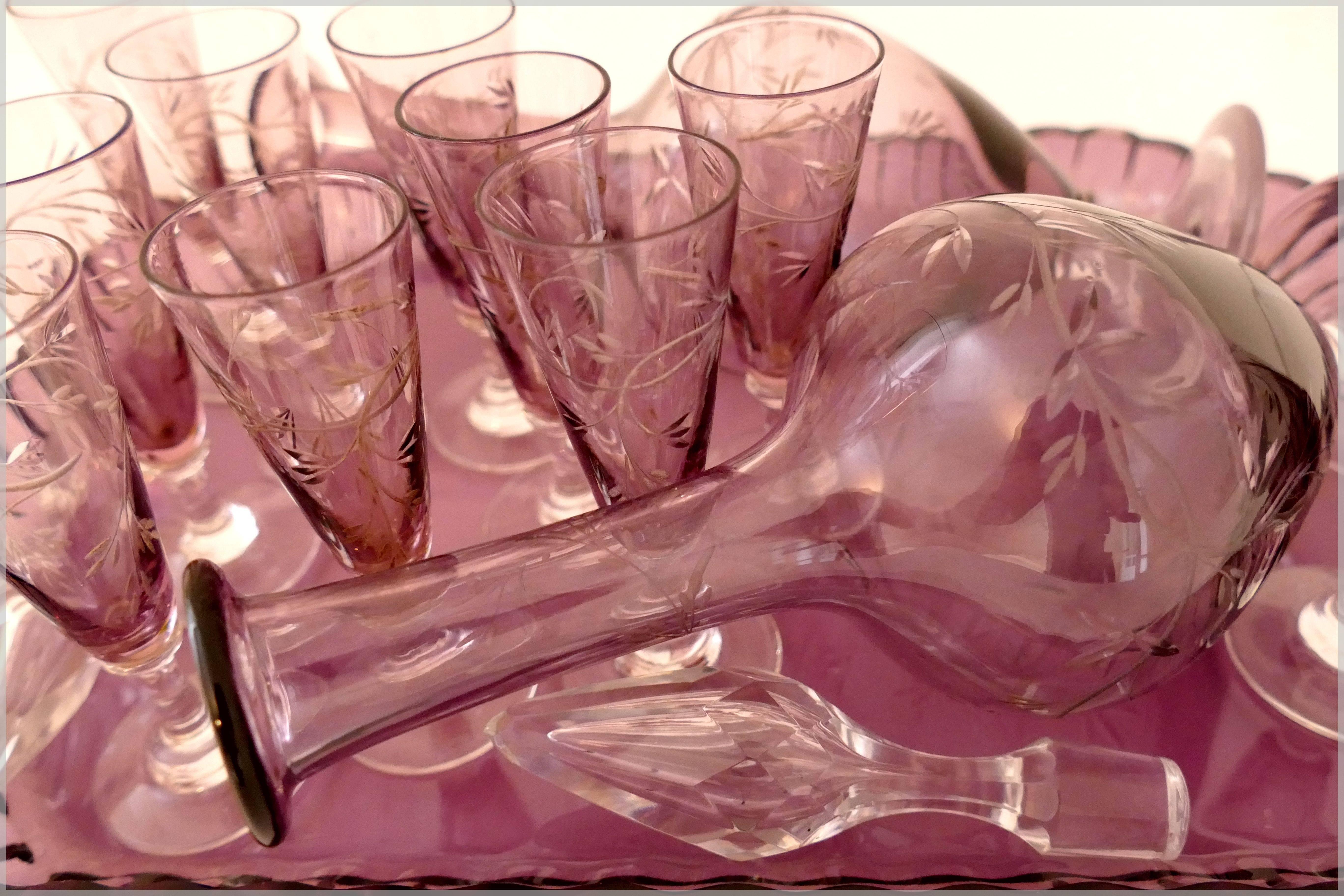 1900s Saint Louis amethyst cut crystal liquor set decanters cordials and tray.

Exceptional and antique French Saint Louis cut crystal liquor or aperitif service circa 1900, comprised of two decanters, ten cordial glasses and original tray.