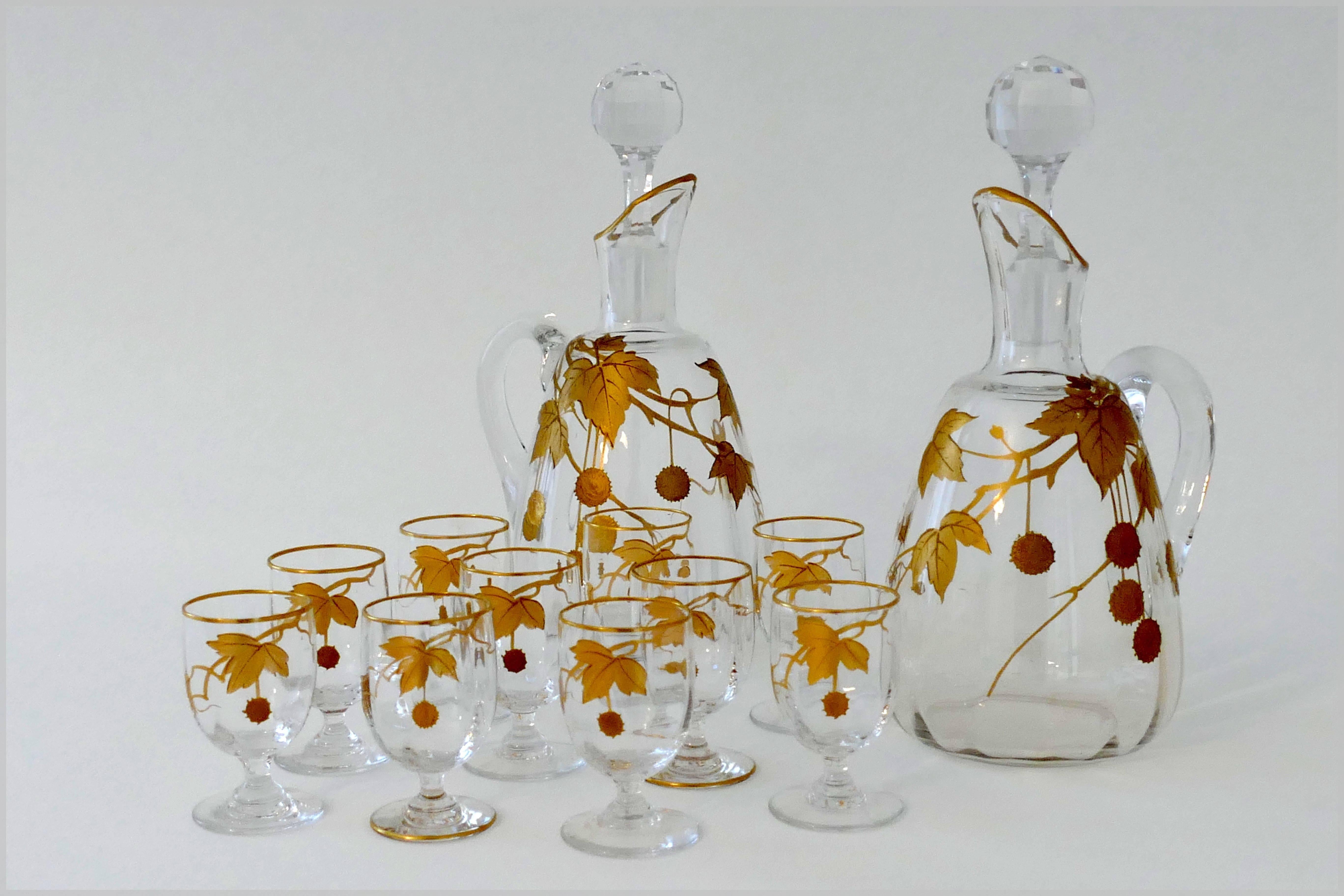 1900 rare baccarat gold crystal liquor or Aperitif service, sycamore tree model.

Very rare liquor or Aperitif service in crystal Baccarat, in Art Nouveau decor painted with leaves and fruit of the sycamore tree. This service consists of two