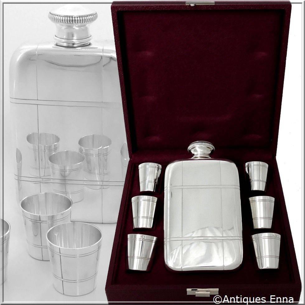 Rare French all sterling silver hip flask gift set with six cups, original case.

This service includes six sterling silver cups and a sterling silver flask. Presented in a presentation gift box and a protective fabric case for the flask. No
