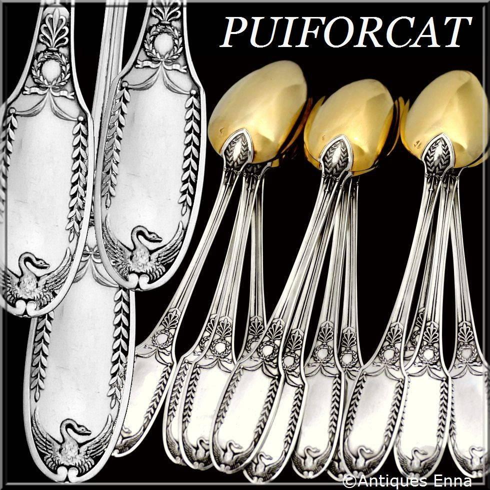 Puiforcat French all sterling silver 18-karat gold tea coffee spoons set 12 pieces, swans model, original box.

A rare set of truly exceptional quality for the richness of pattern. Empire style with carved spatulas on both sides of swan with