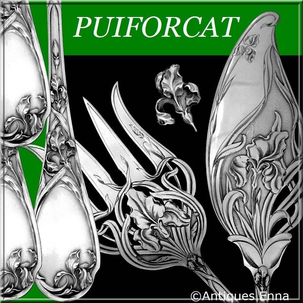 Puiforcat gorgeous French sterling silver fish servers two-piece iris.

Head of Minerve 1st titre for guarantee 950/1000 French sterling silver. 

The set have a fantastic Iris motif in Art Nouveau style. Finesse of design and quality of execution