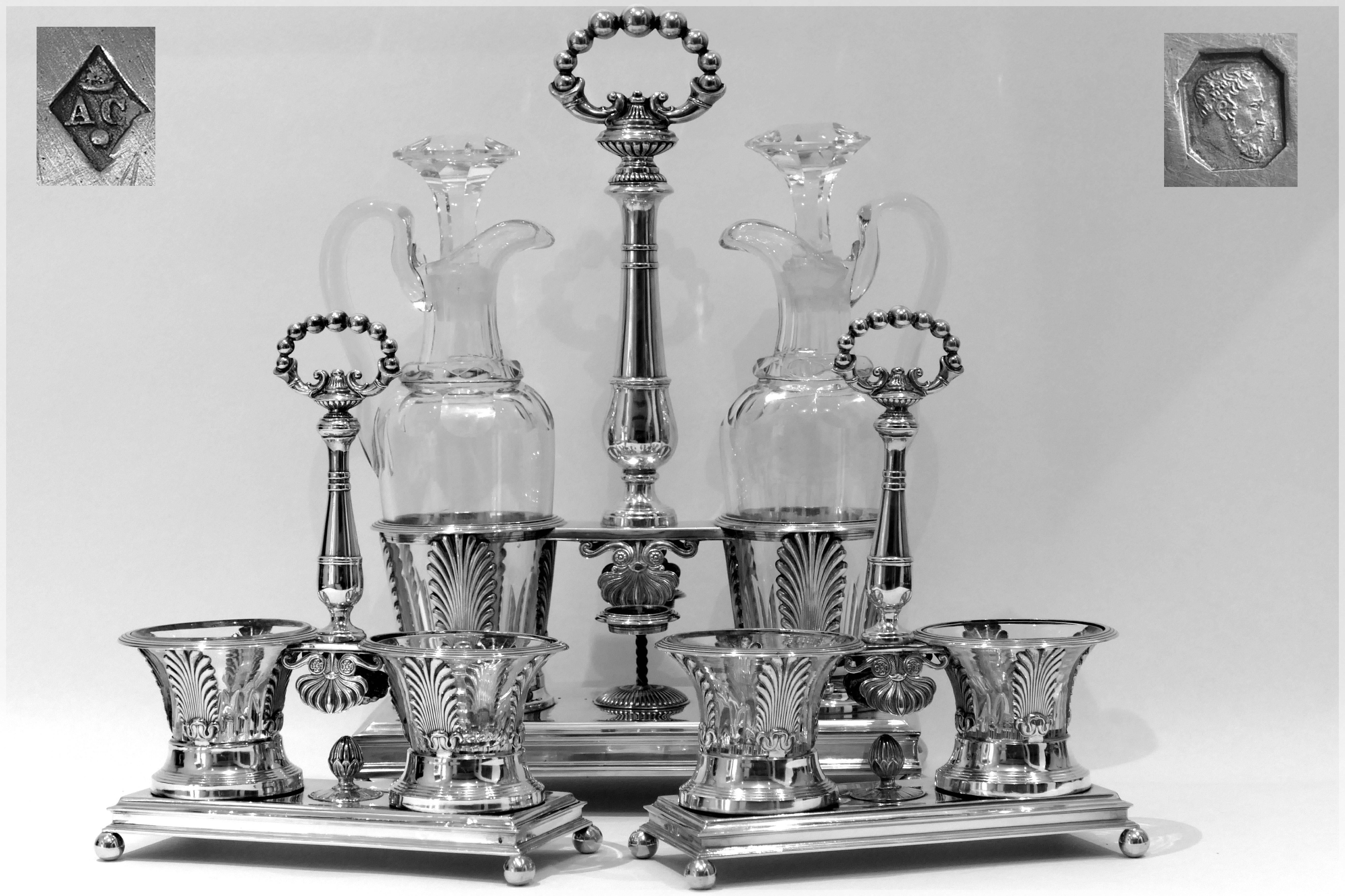 1819 imposing French sterling silver and Baccarat crystal bottles condiment set. 

For Paris 1819-1838, "vieillard", Michel-Ange. 1st titre mark for 950/1000 French sterling silver guarantee.

Extremely rare and imposing antique French
