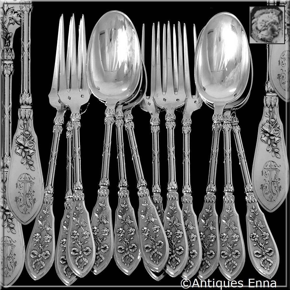 Henin French sterling silver dinner flatware set 12 pieces musical instruments.

Head of Minerve 1 st titre for 950/1000 French sterling silver guarantee.

Exceptional French sterling silver dinner flatware set 12 pieces. The sophistication of this