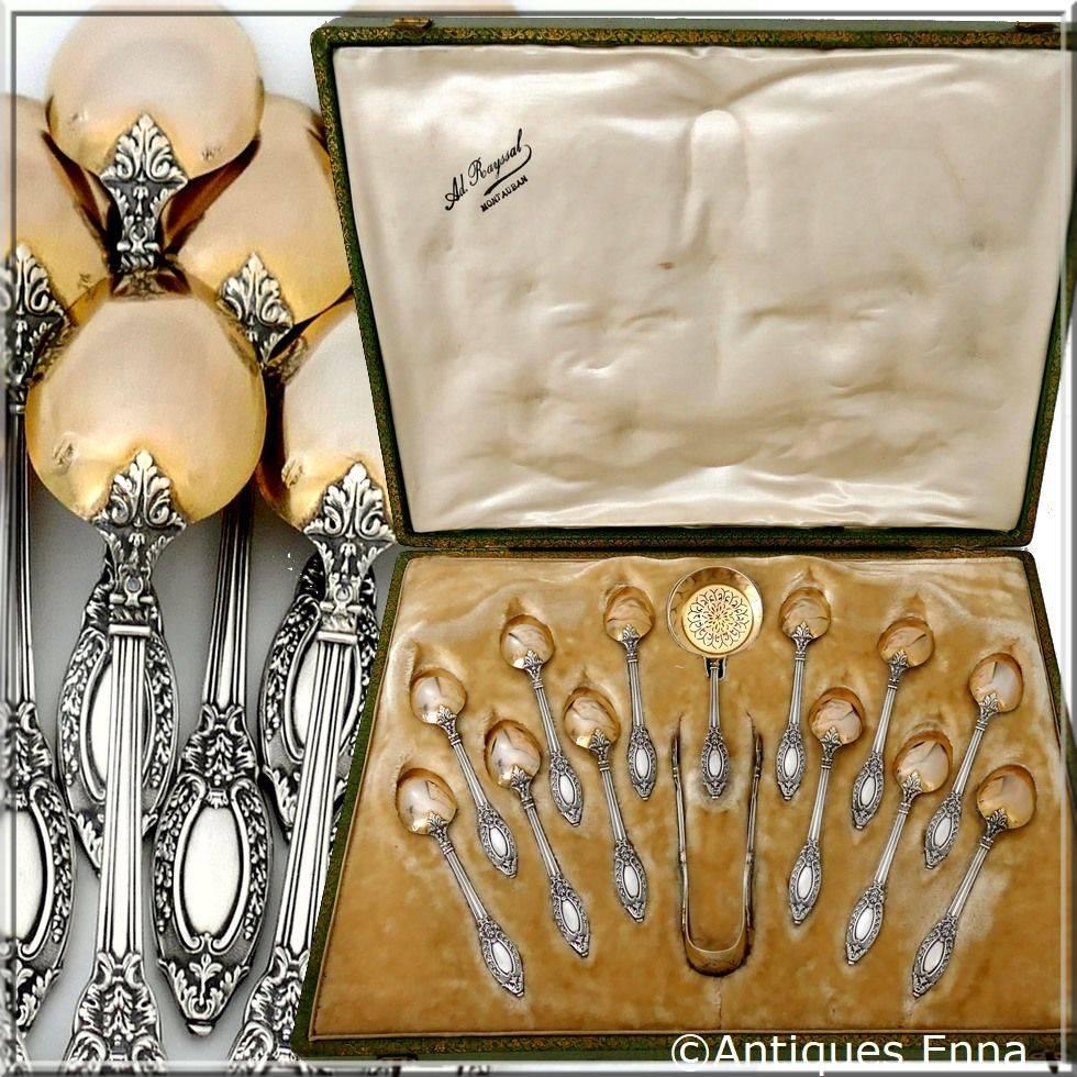 A rare French sterling silver 18-karat gold tea service 14 pieces, it's a production of sterling silver luxury. This complete set is housed within the original presentation box with compartments for each piece. The set includes 12 tea spoons with