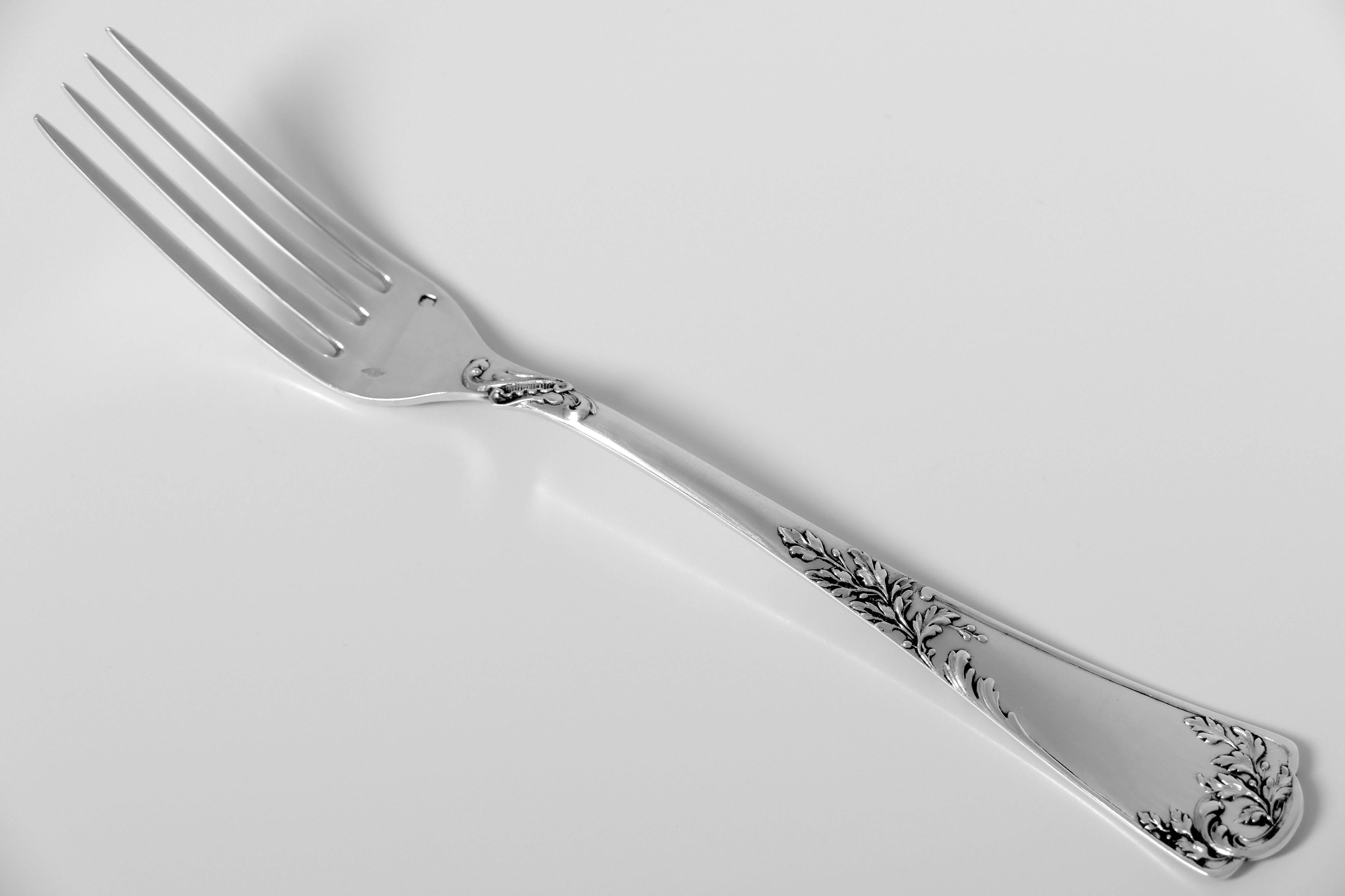Handles have fantastic decoration in the Rococo style. Model called: Louis XV, Foliate, in the catalog of the Maison Puiforcat. 

Head of Minerve 1st titre on the handles for 950/1000 French sterling silver guarantee.

Prestigious silversmith:
Emile